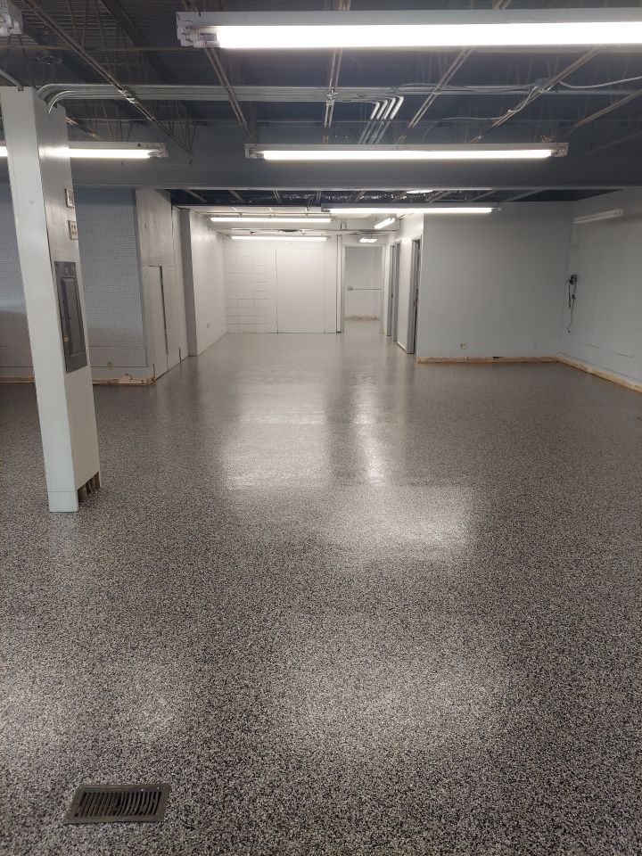 Interior Concrete Coating with Domino & Inlay by Copperhead Coatings
