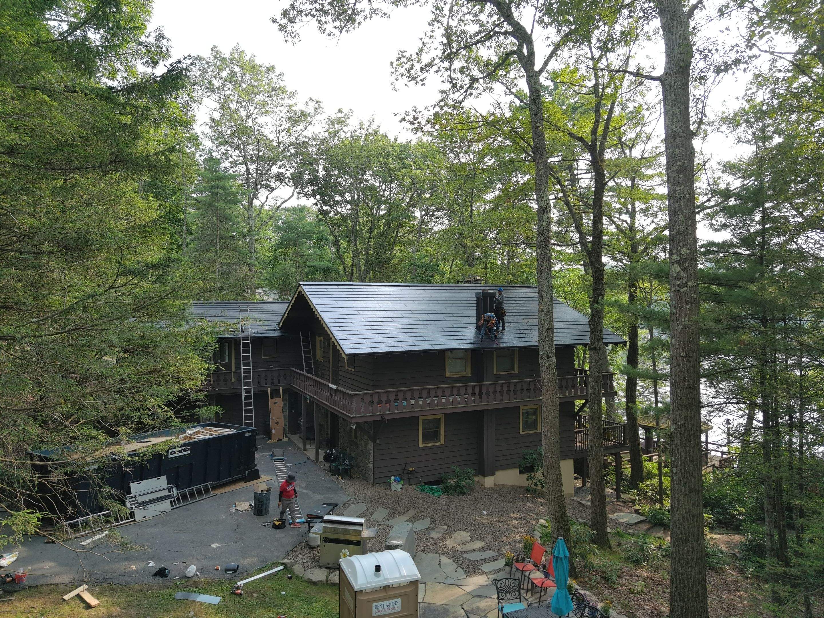Stunning Tesla Solar Roof Cabin in the Woods by American Home Contractors