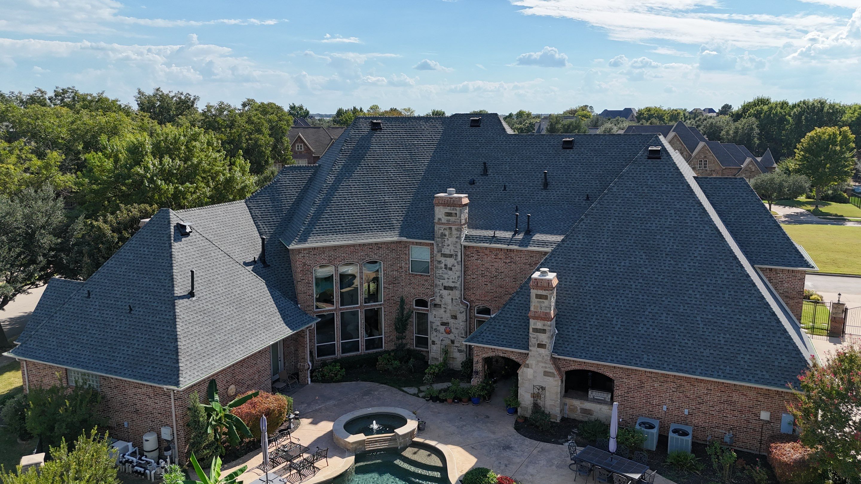 Southlake Texas Estate - Roof, Copper Awning and Gutter Project by First United Roofing & Construction
