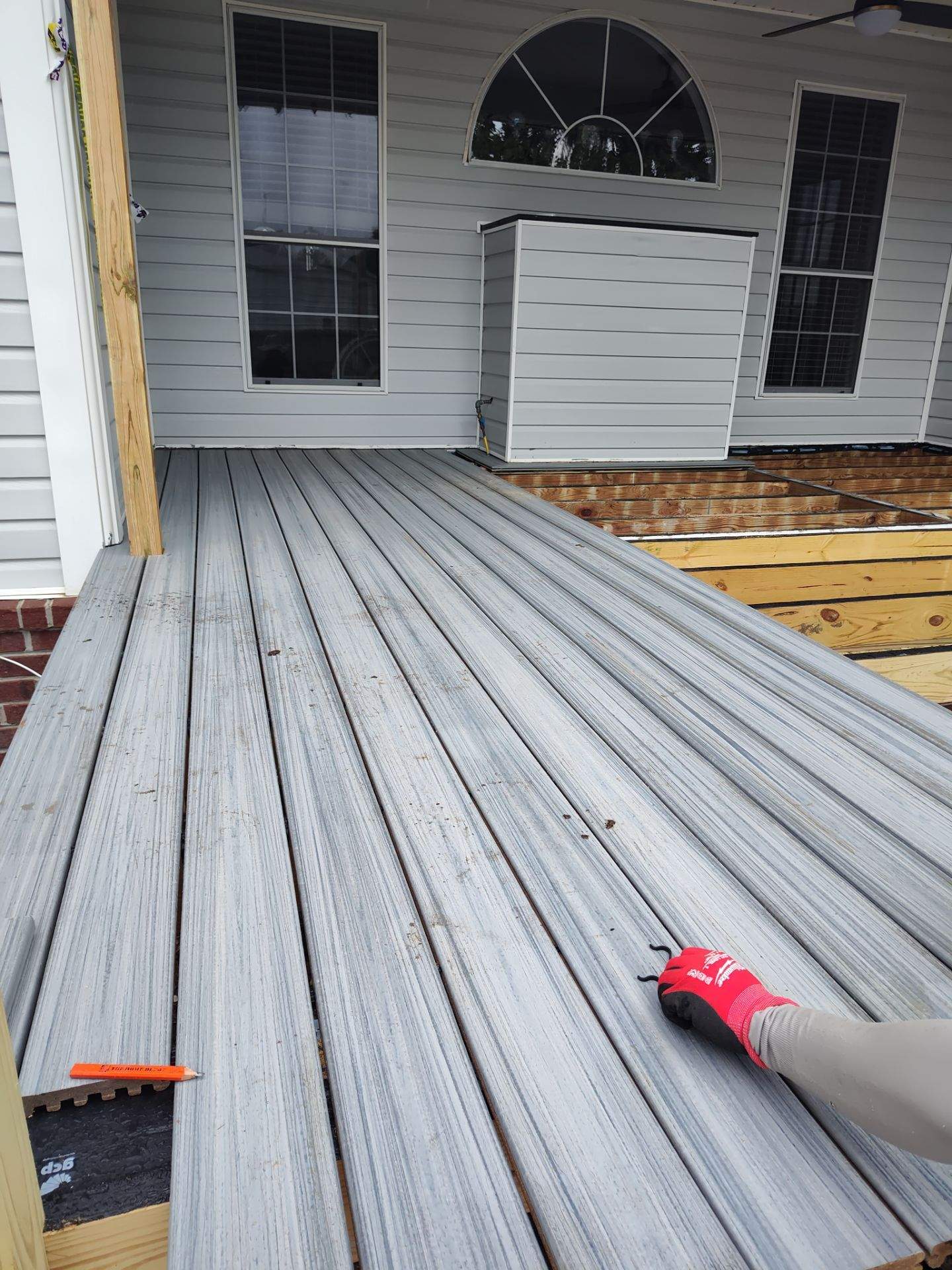 Outside porch and concreate work by Cornerstone Home Builders, LLC