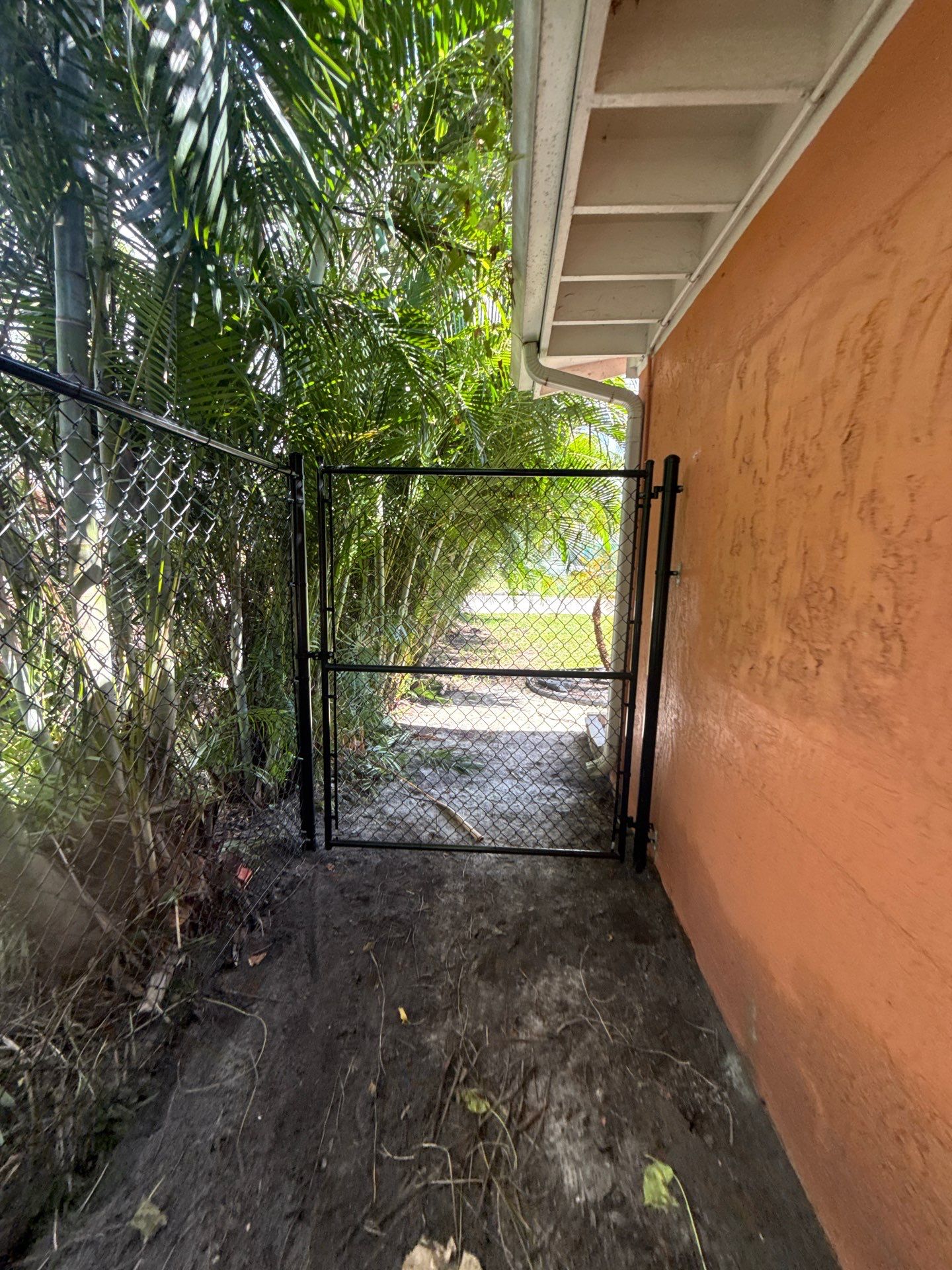 Black Chain Link Fence Installation and Site Clearing in Nokomis by True Fence LLC