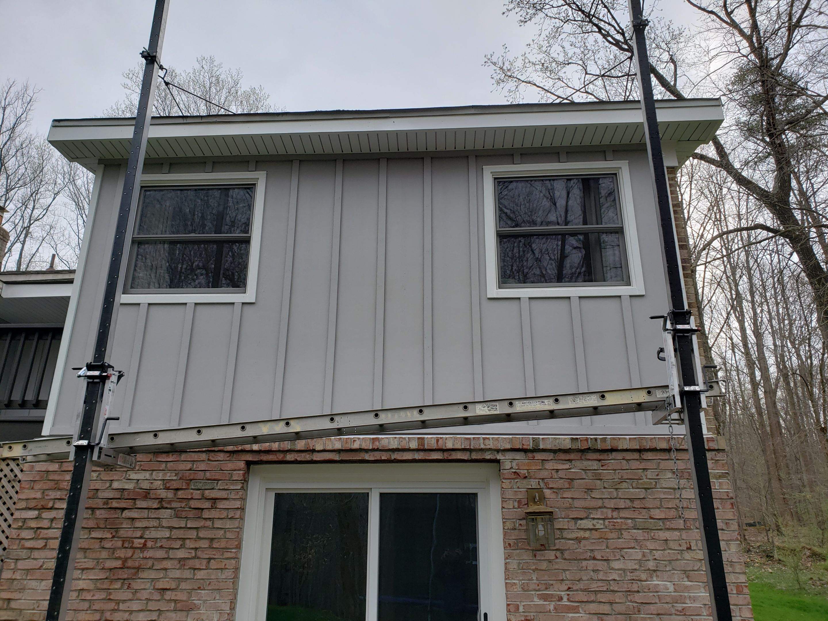 Roof, Siding, Door, and gutter replacement by American Home Contractors
