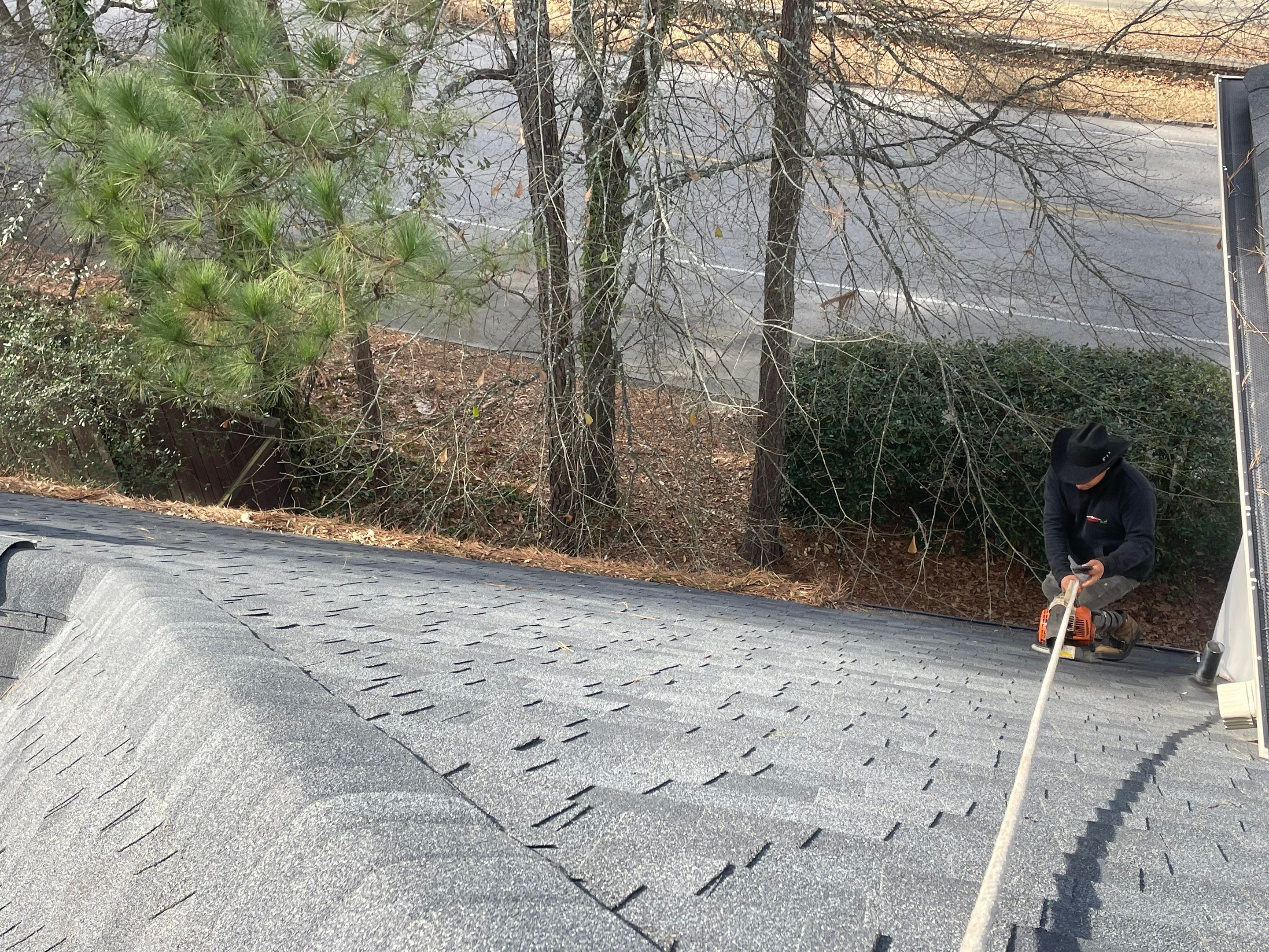 Cleaning Gutters  by Deerfield Roofing LLC