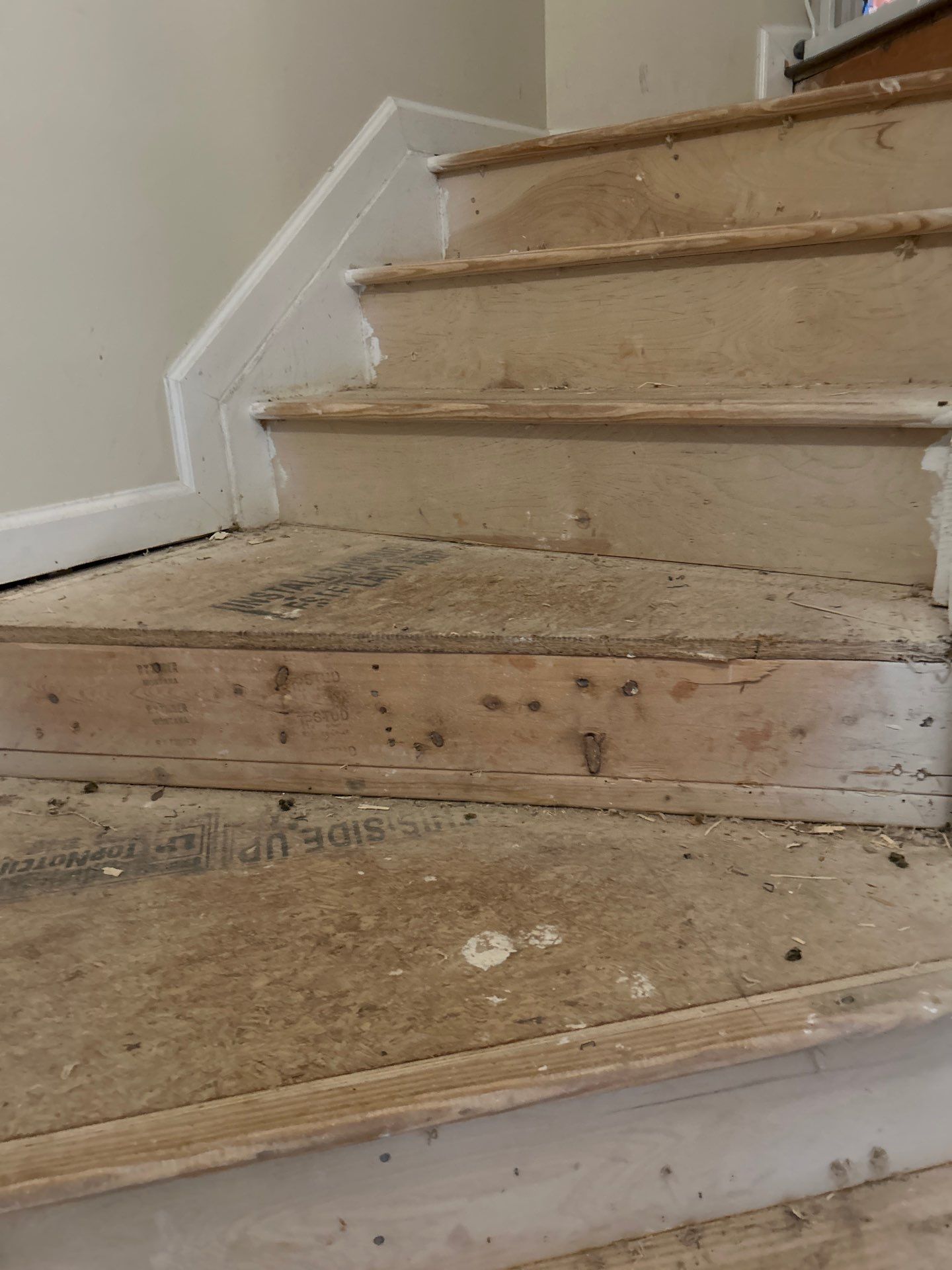 UPGRADE to solid oak stair treads by Footprints Floors of East Atlanta