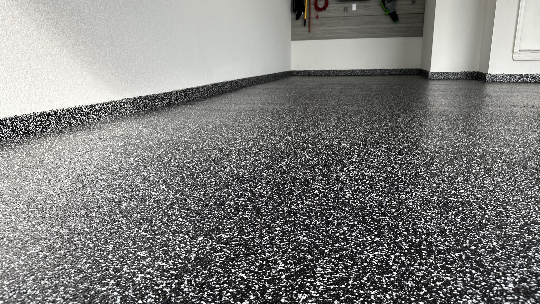 John H. received his dream garage with cabinets and a Banner Garage Floor by Banner Garage