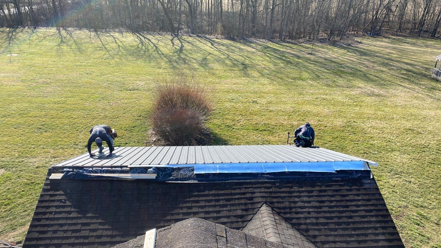 Residential Roofing Installation using Performance Panel Metal - Frost Black by RoofX 