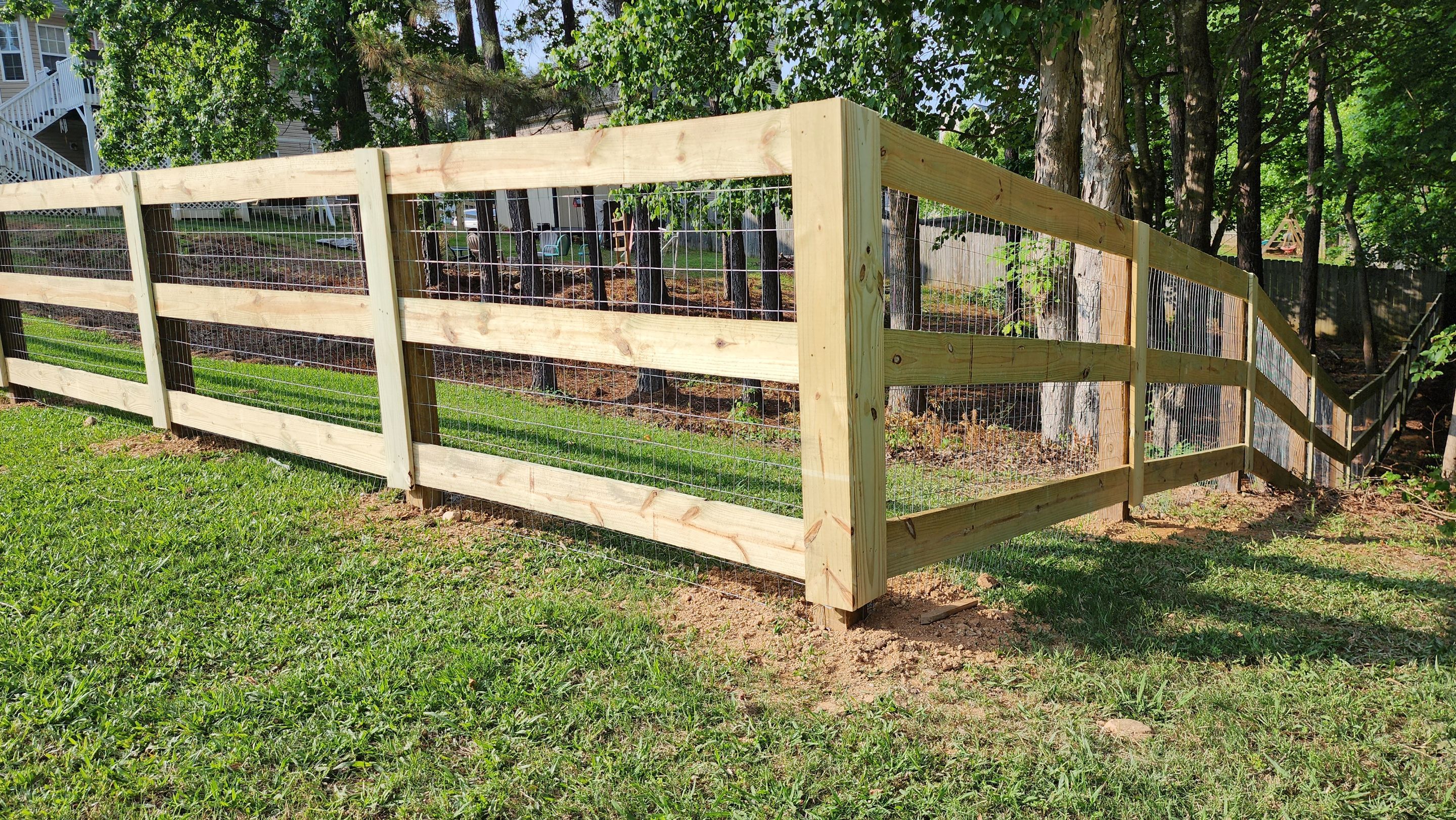 Fence Installation of 3 Rail Ranch with Wire Backing by Titans of Timber Fence & Stain