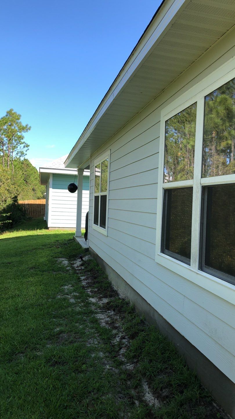 Seamless Gutter Installation using White by Gutter Professors