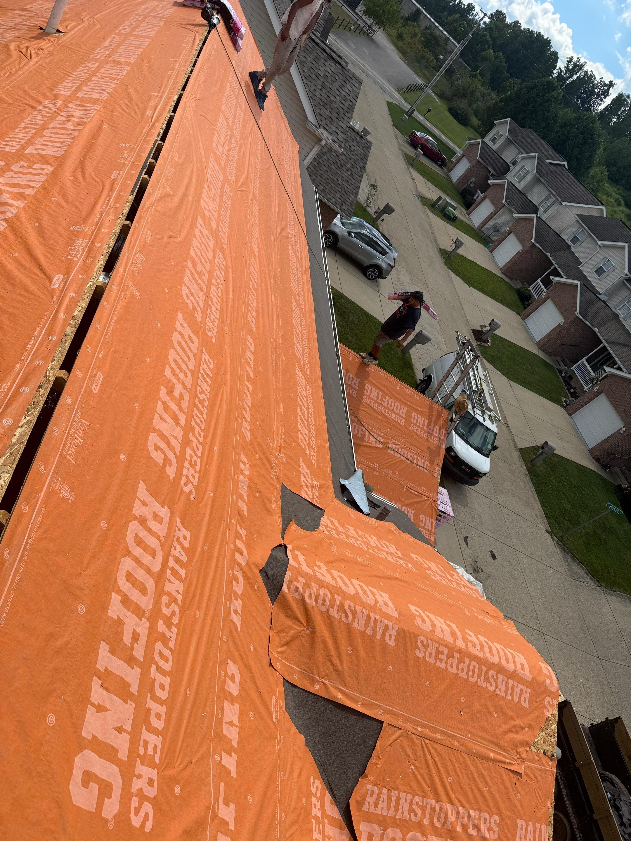 Residential Roofing Installation using Driftwood by Rainstoppers Roofing