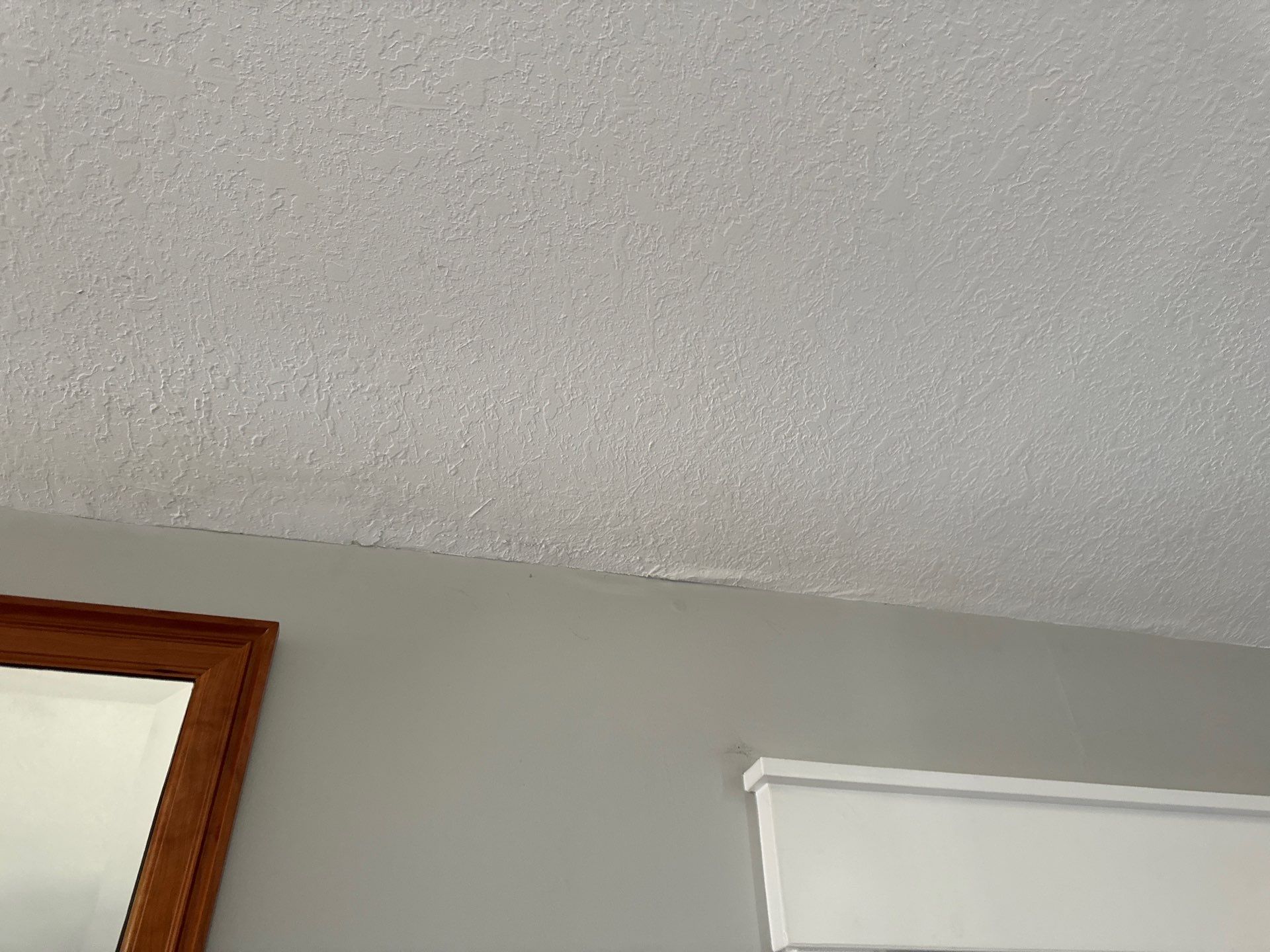 Garage dry wall repair/ re-texture, re-paint by Gordon Painting