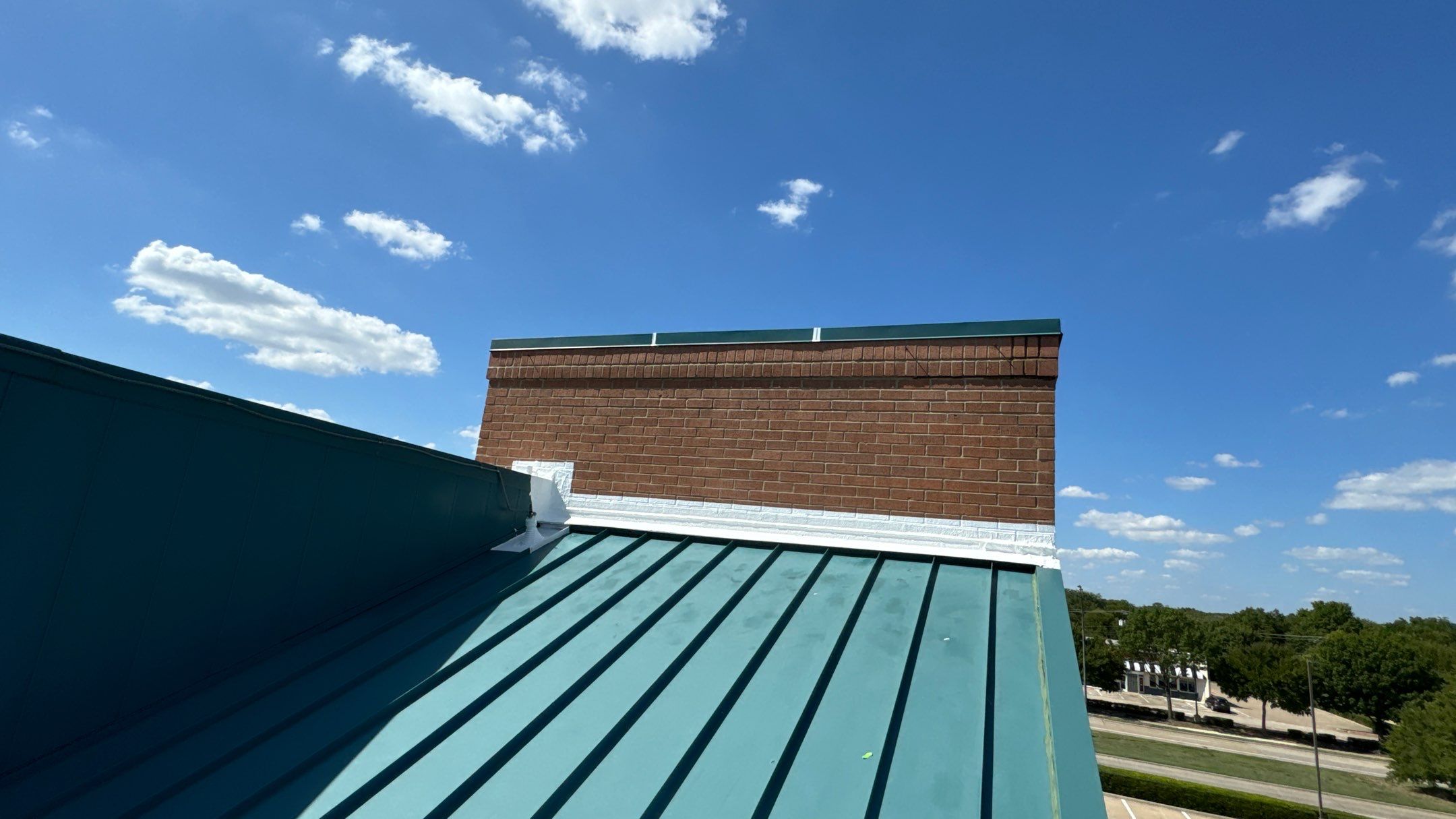 Commercial Roofing Repair using TRP #924 Eterna-Sil Premium Silicone Roof Coating by Harvey Roofing & Construction