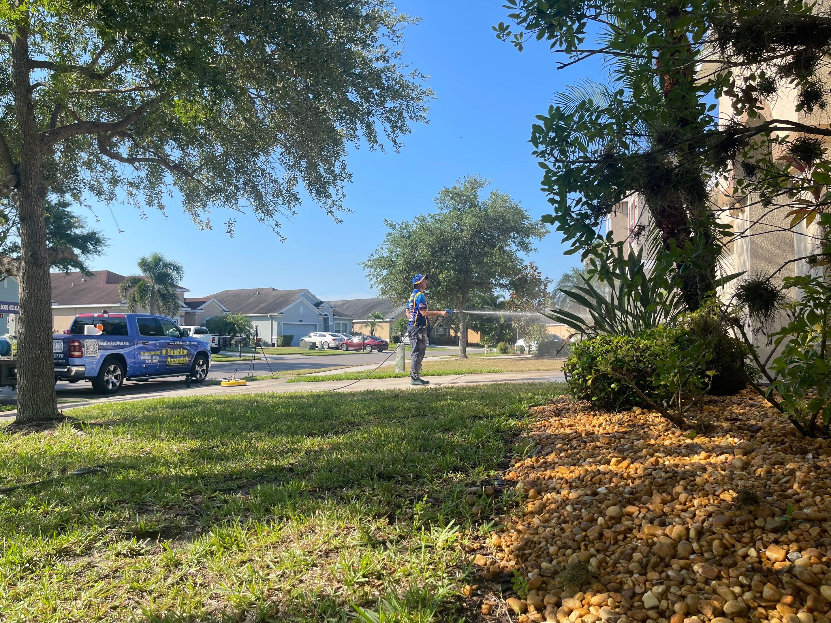 Asphalt Shingle Roof Soft Wash Cleaning & Concrete Pressure Washing in CopperStone Community, Parrish, FL by Sunshine AquaWash
