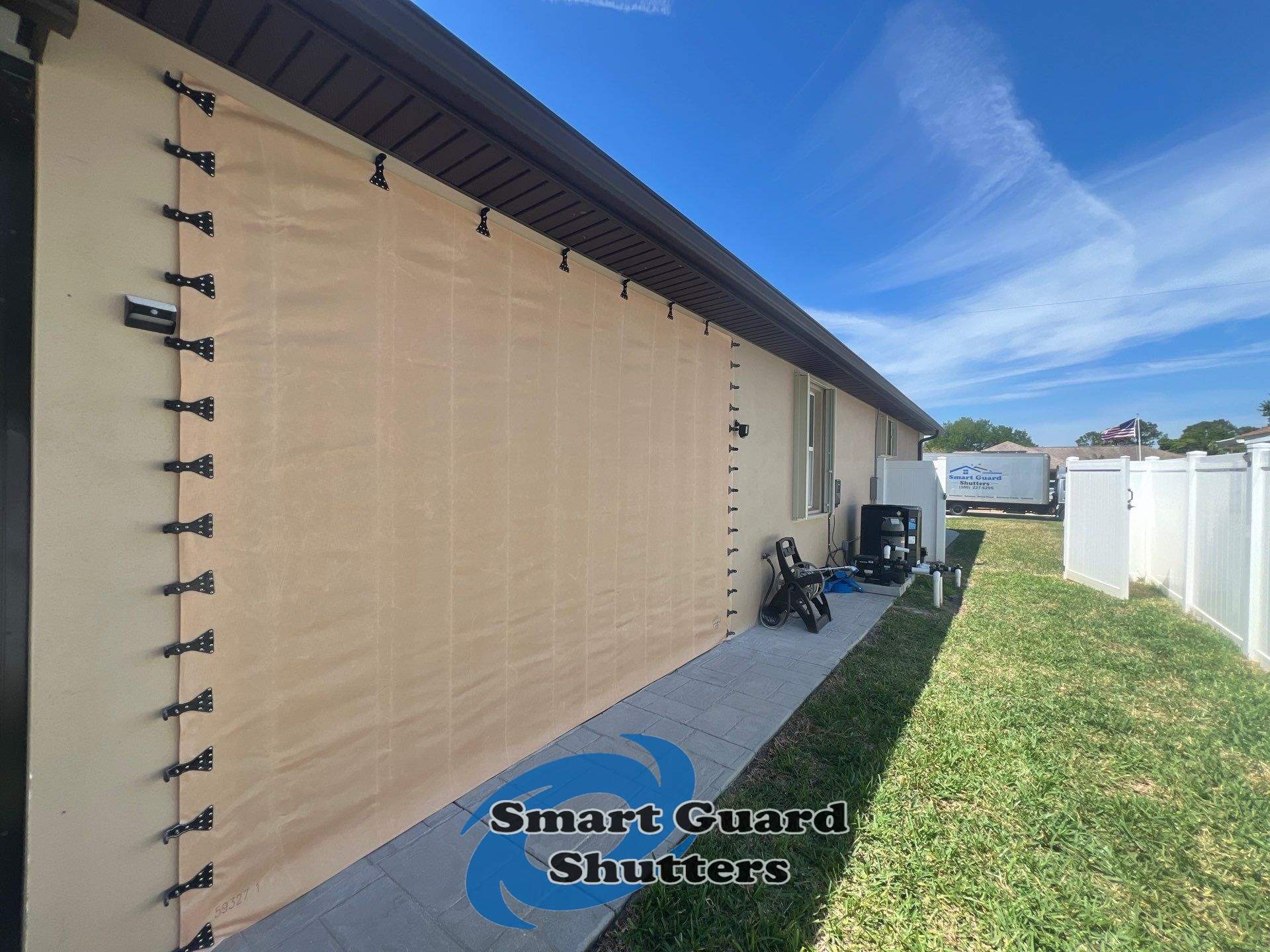 Hurricane Protection in Tan / Ivory by Smart Guard Shutters