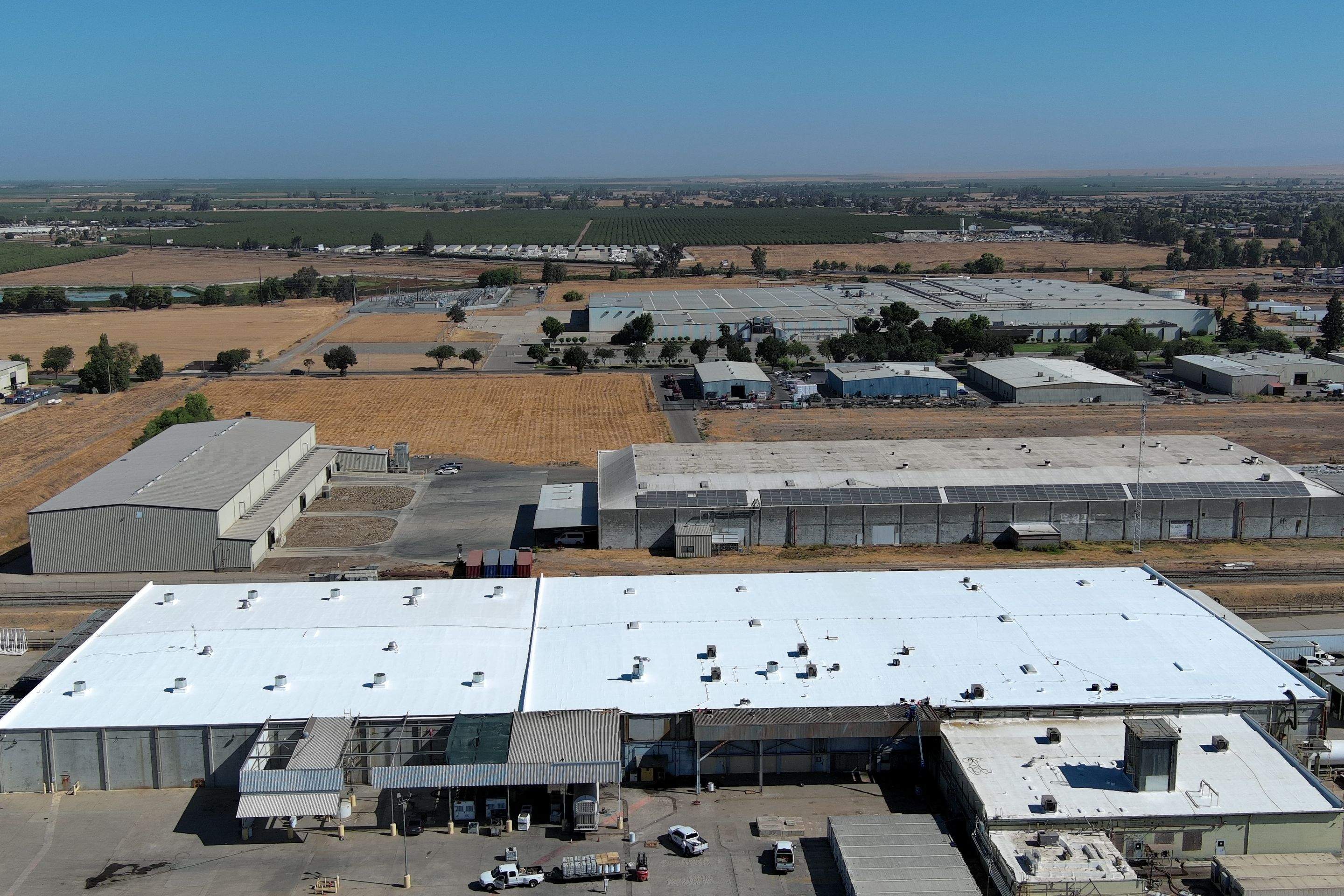 Pro Farms Spray foam roofing project by Straight Edge Roofing Inc