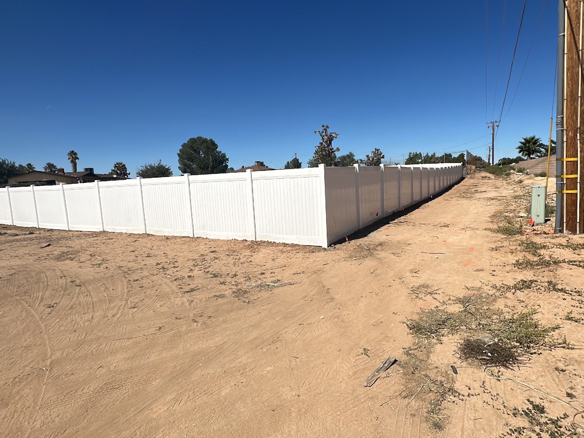 White picket fence  by Fence Guys Inc. 