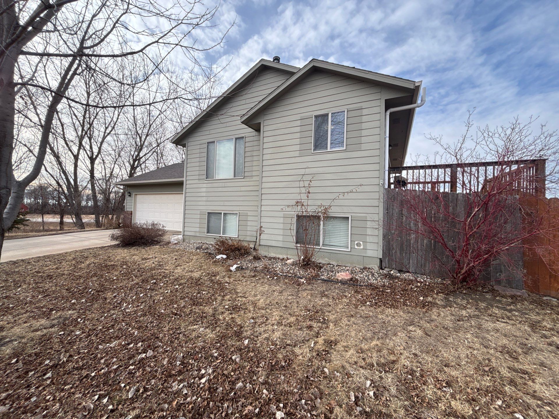 Full Exterior Residential Painting and Siding Refresh in Sioux Falls by Select Painting, Coatings & Garage Cabinets