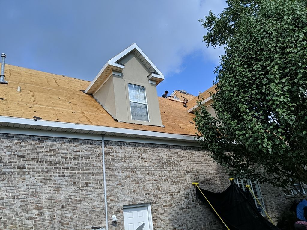 Residential Roofing Repair using Roof Replacement by American Roofing & Construction LLC