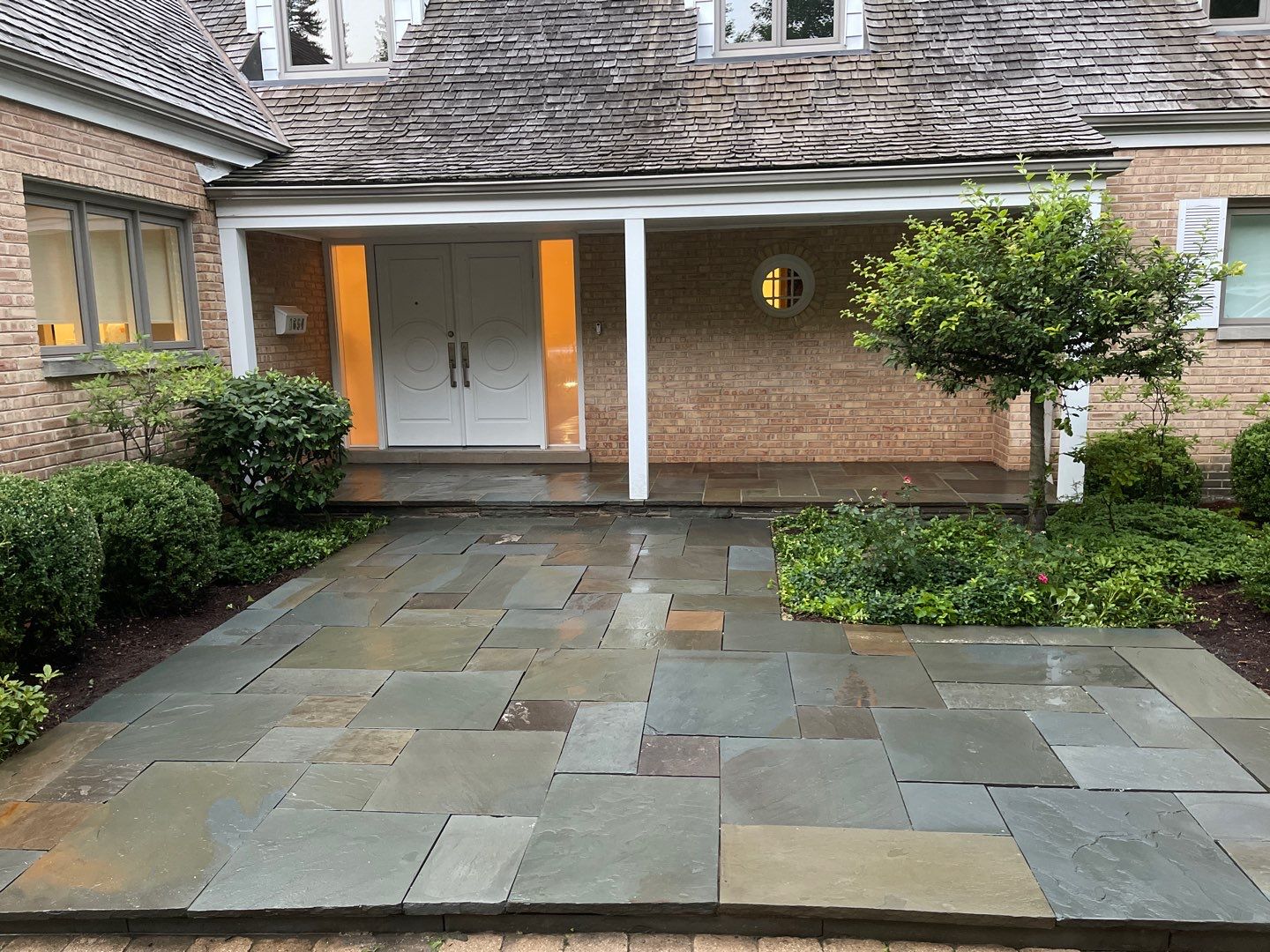 Bluestone patio cleaning by Northern Power Washing LLC.
