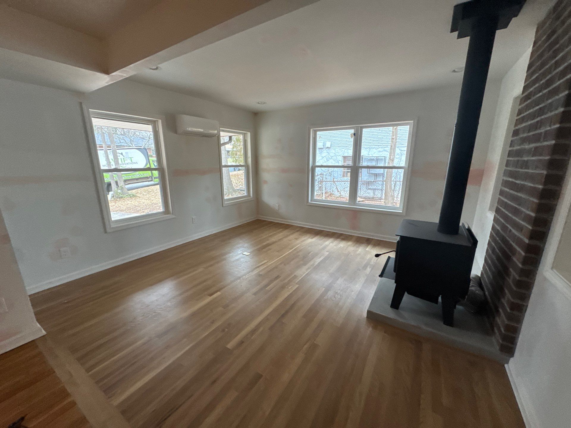 Full Home Transformation with Enclosed Living Room Addition by Swift Home Renovations