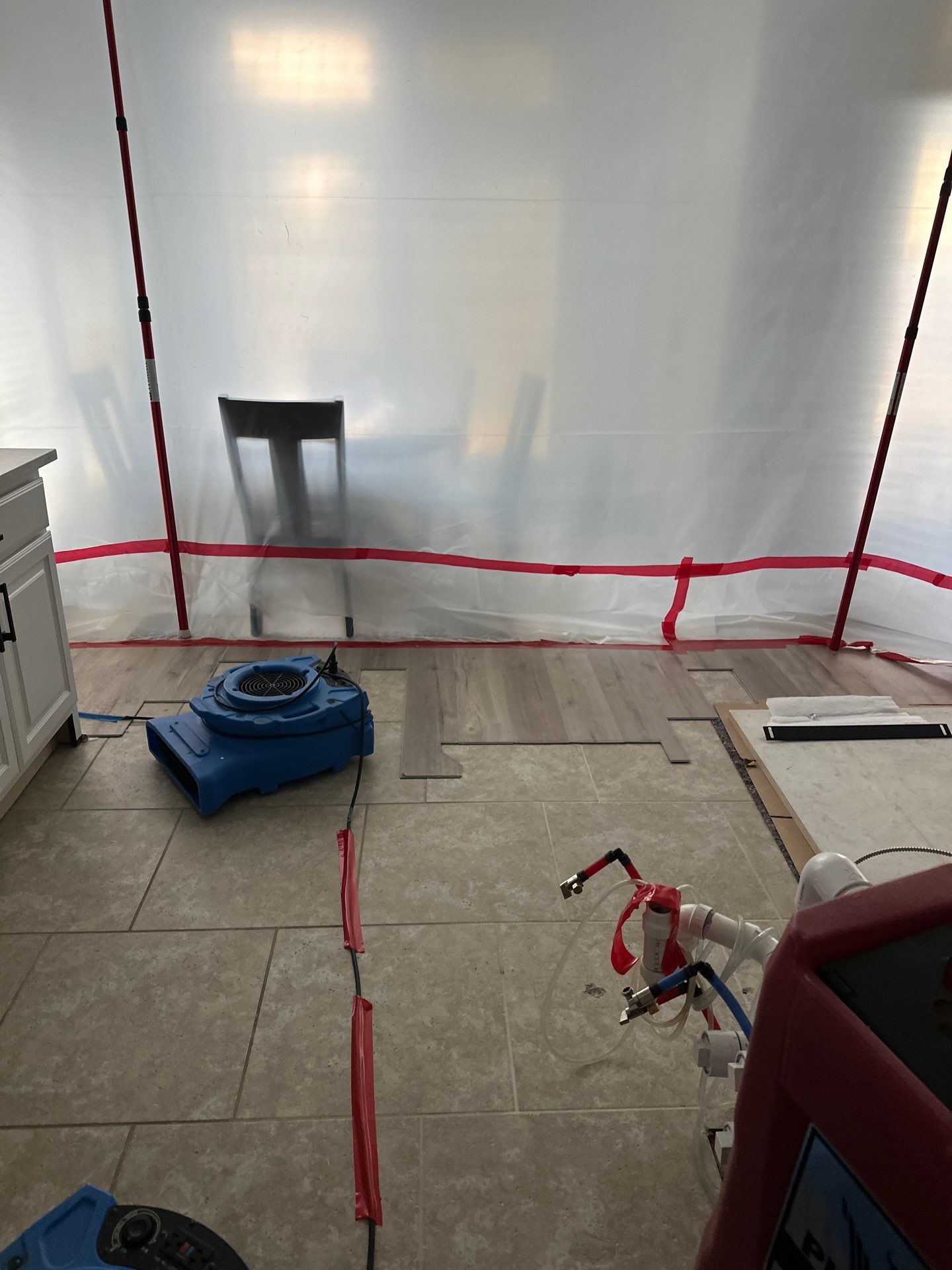 Kitchen Remodel using Water mitigation equipment by L&T General Contractors and Restoration INC