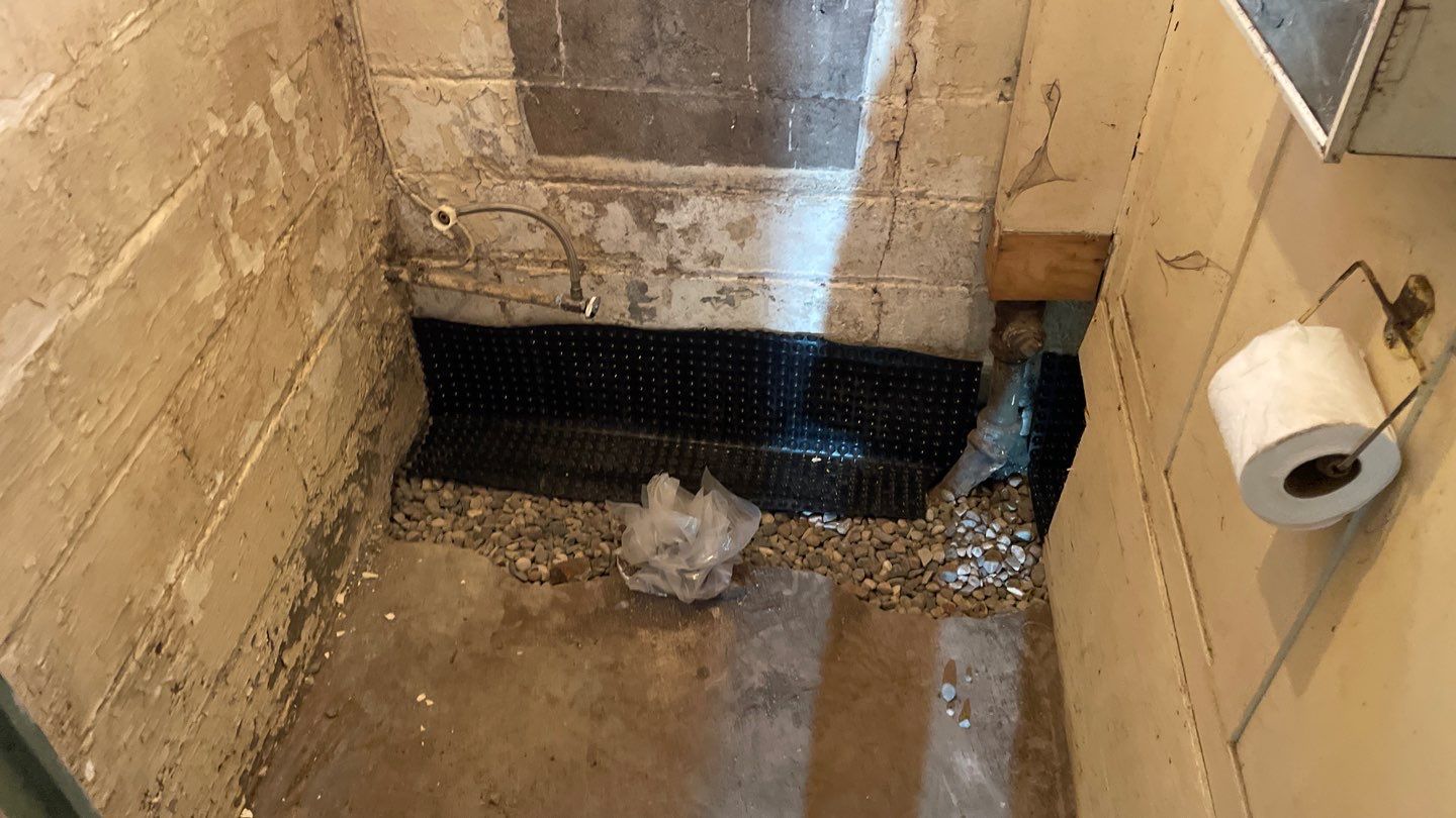 Interior Drain Tile for a South Minneapolis Basement by Waterproofing Northeast