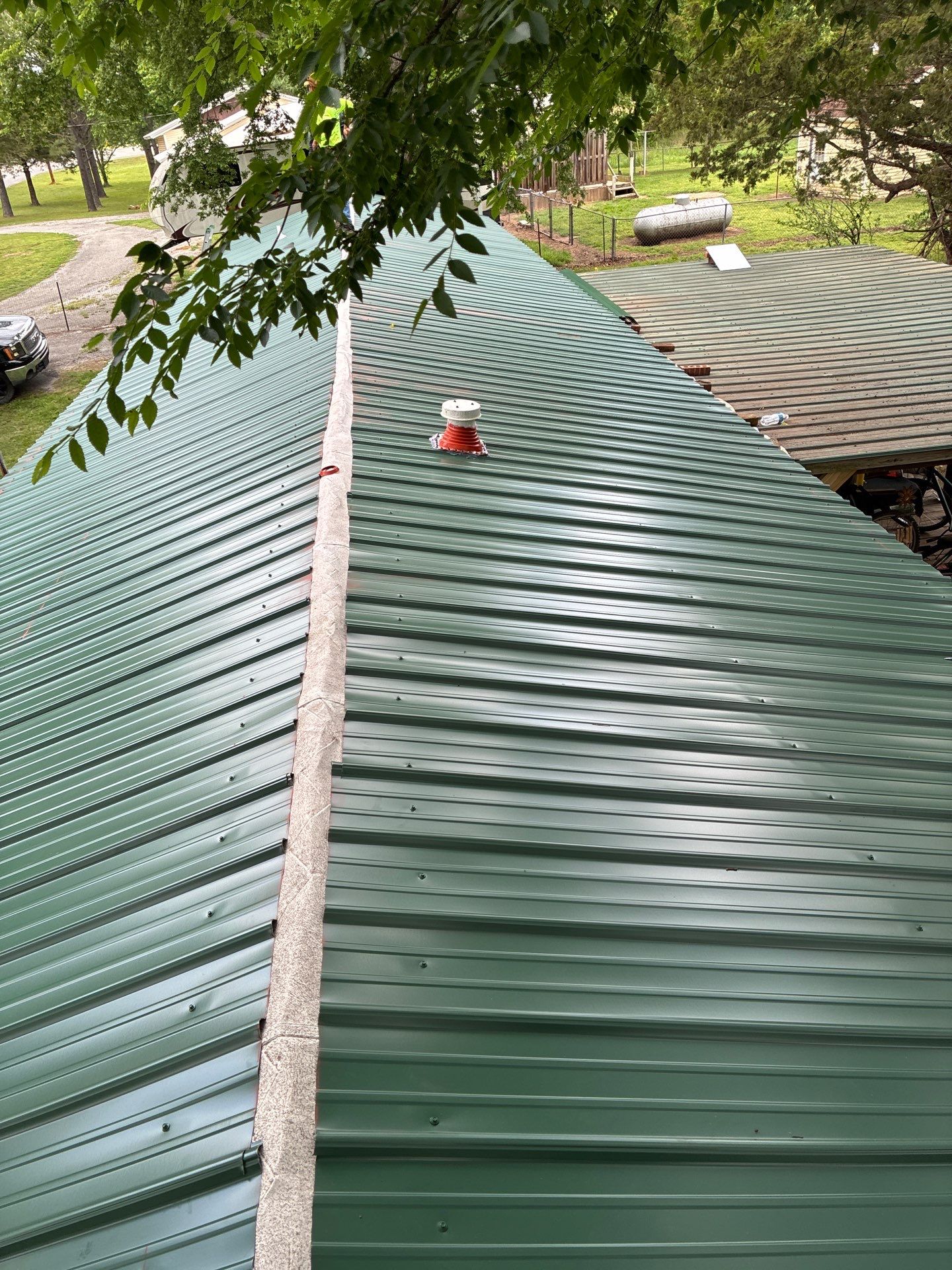 Metal roof installation by In & Out Construction & Remodeling, LLC