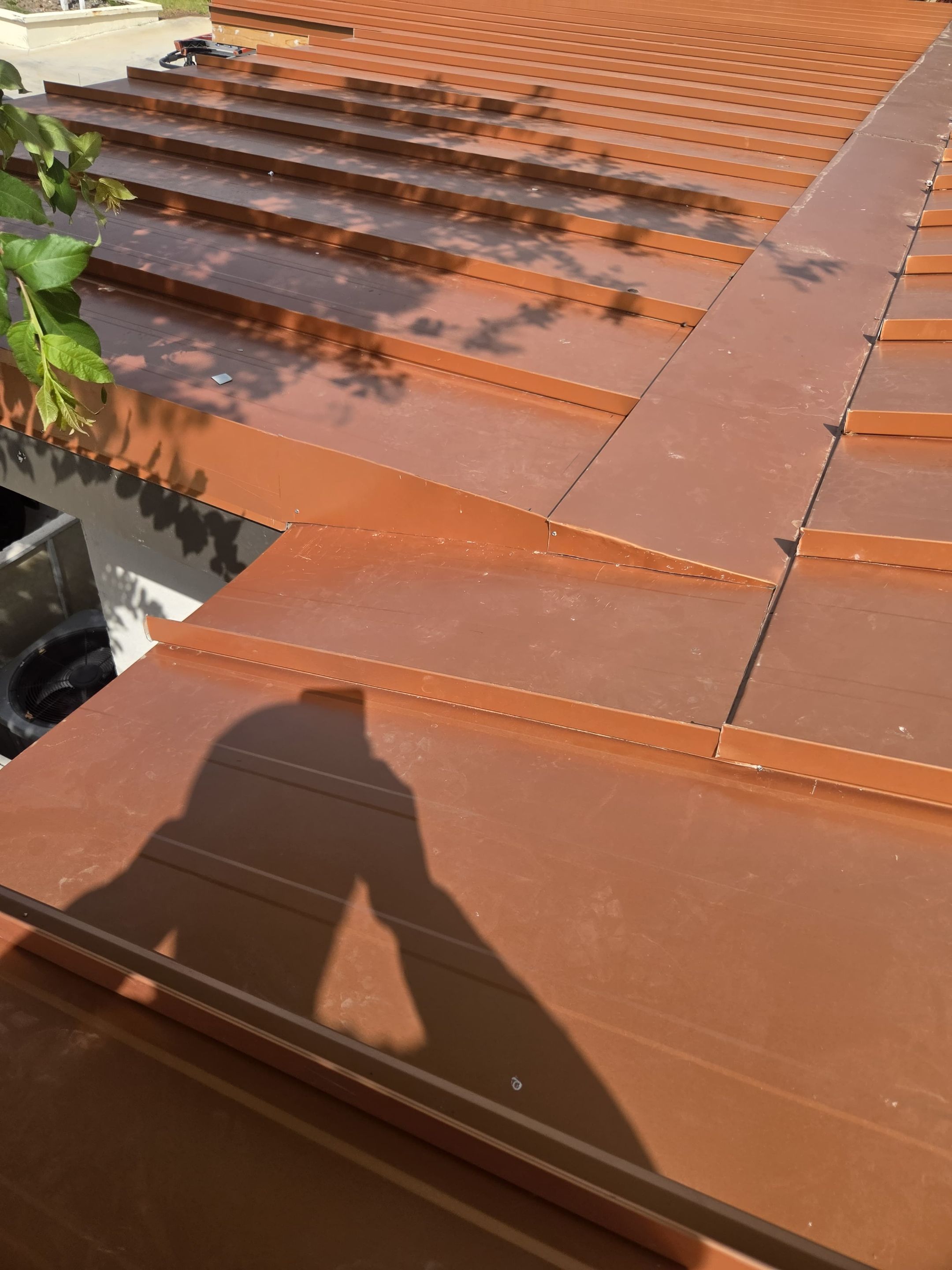 Copper Standing Seam Metal Roof Installation for Laredo Medical Clinic by JM Flores Roofing & Construction, Inc