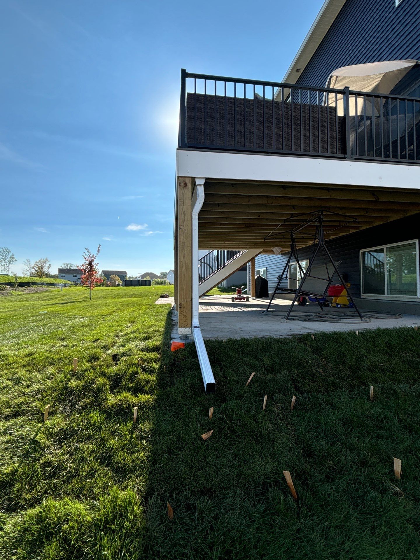Under Deck Gutter System Installed by Next Level Seamless Gutters / Exteriors Inc.