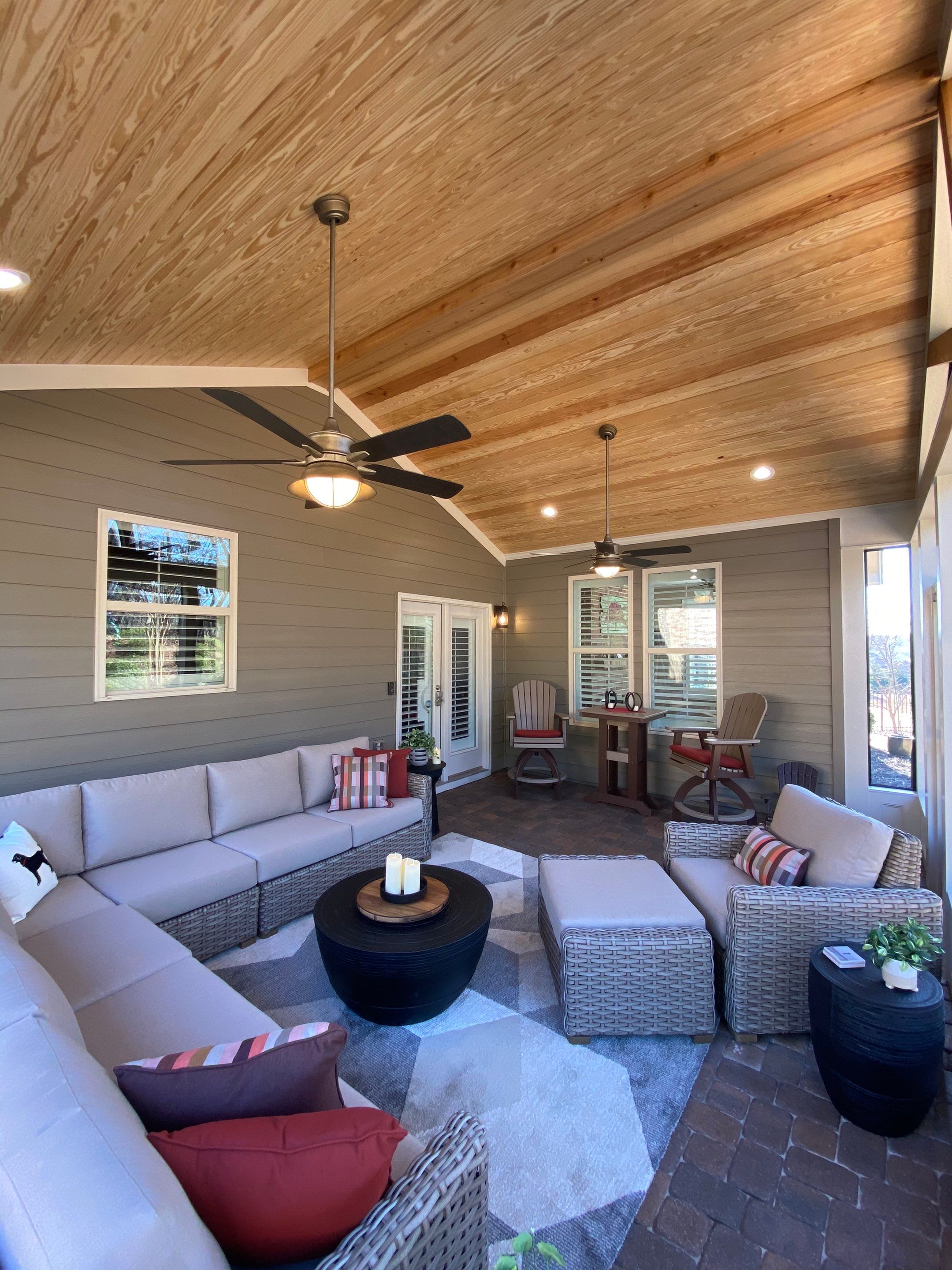 Custom Screened Porch Addition with Vaulted Wood Ceilings in Woodstock by Swift Home Renovations