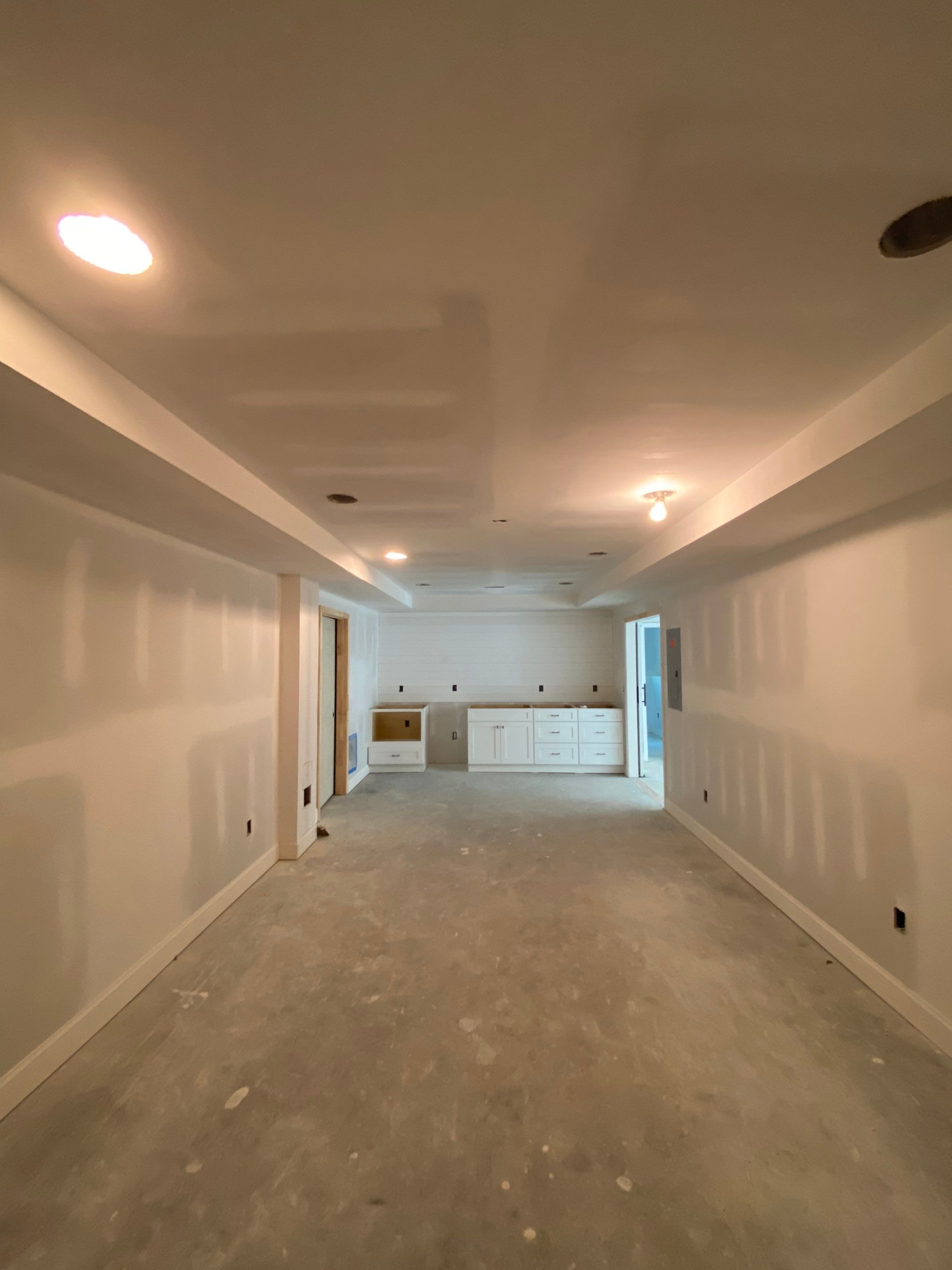 Marietta Basement Remodeling Featuring Custom Wet Bar and Marble Shower by Swift Home Renovations