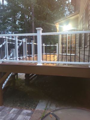 Fuquay-Varina Outdoor Upgrade – Composite Deck & Paved Landing