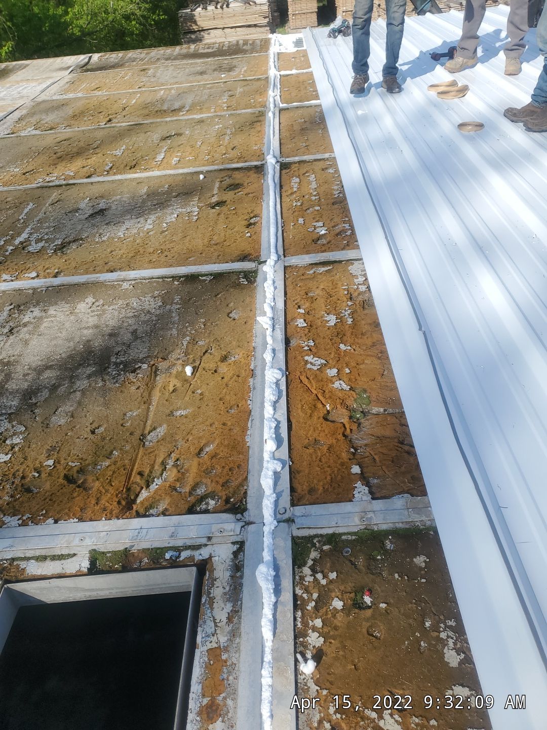 Commercial Roofing Installation using Aluminum Roofing panels by Hostetler Roofing