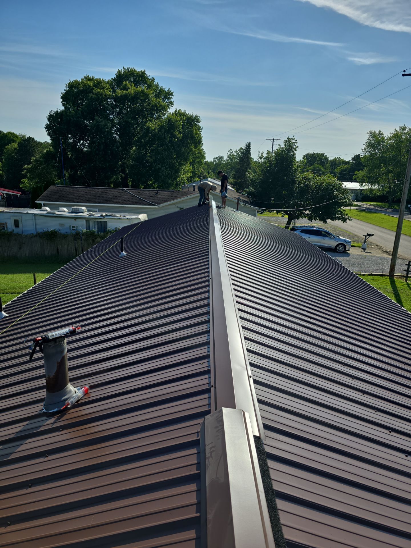 Residential Roofing Installation using Metal by Rainstoppers Roofing