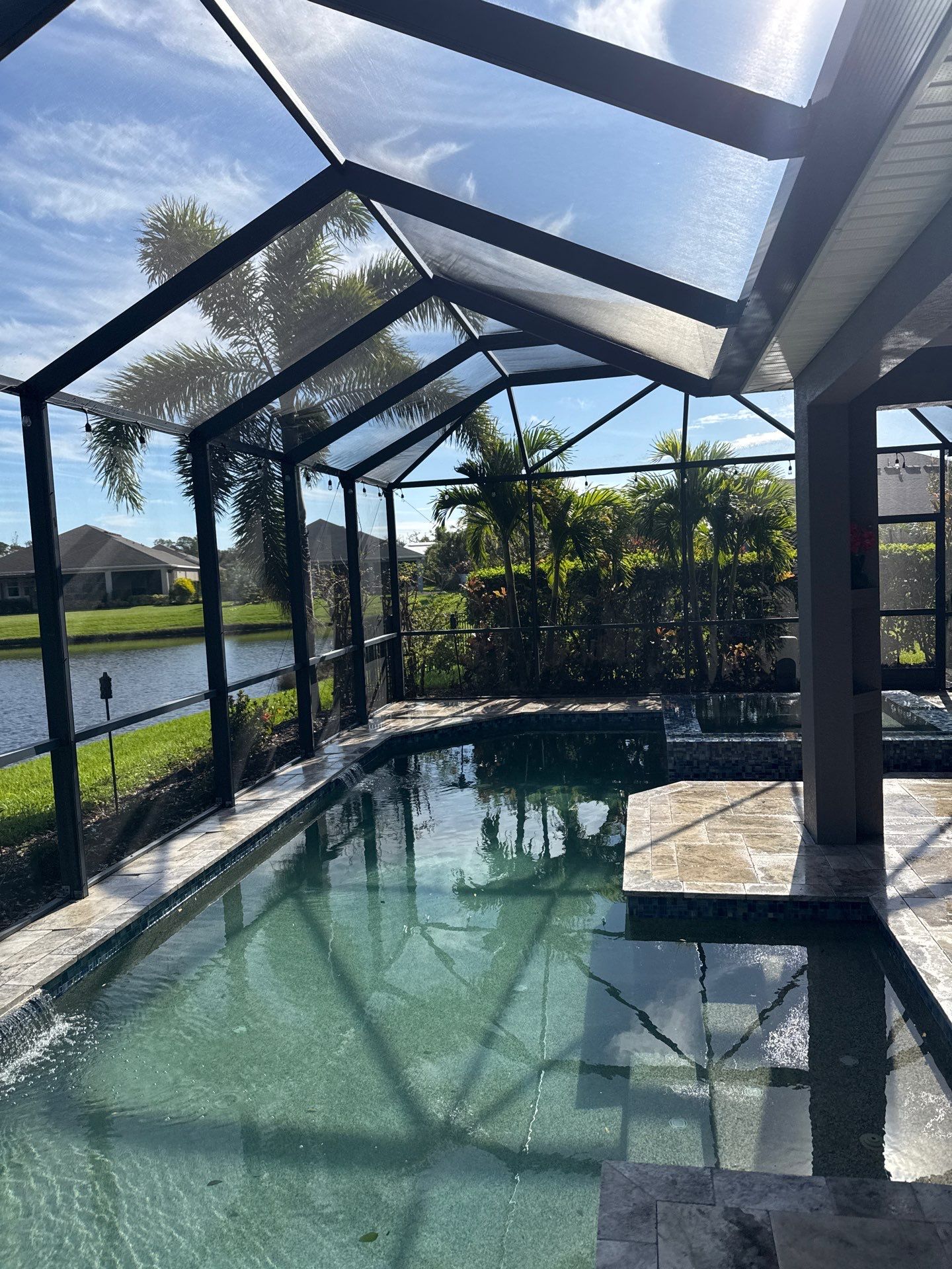 Travertine Pool Deck and Screen Enclosure Cleaning in Ellenton, FL | Oakleaf Hammock Community by Sunshine AquaWash