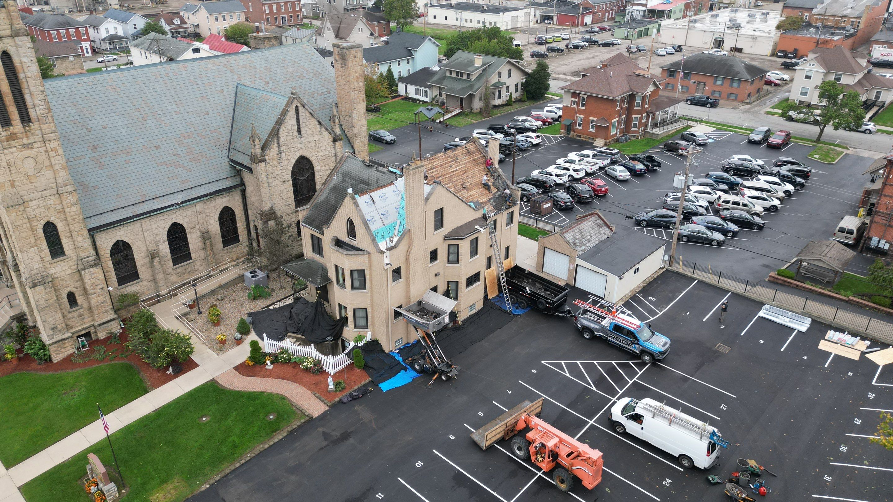 Commercial Roofing Installation using Standing Seam Metal - Frost Black by RoofX 