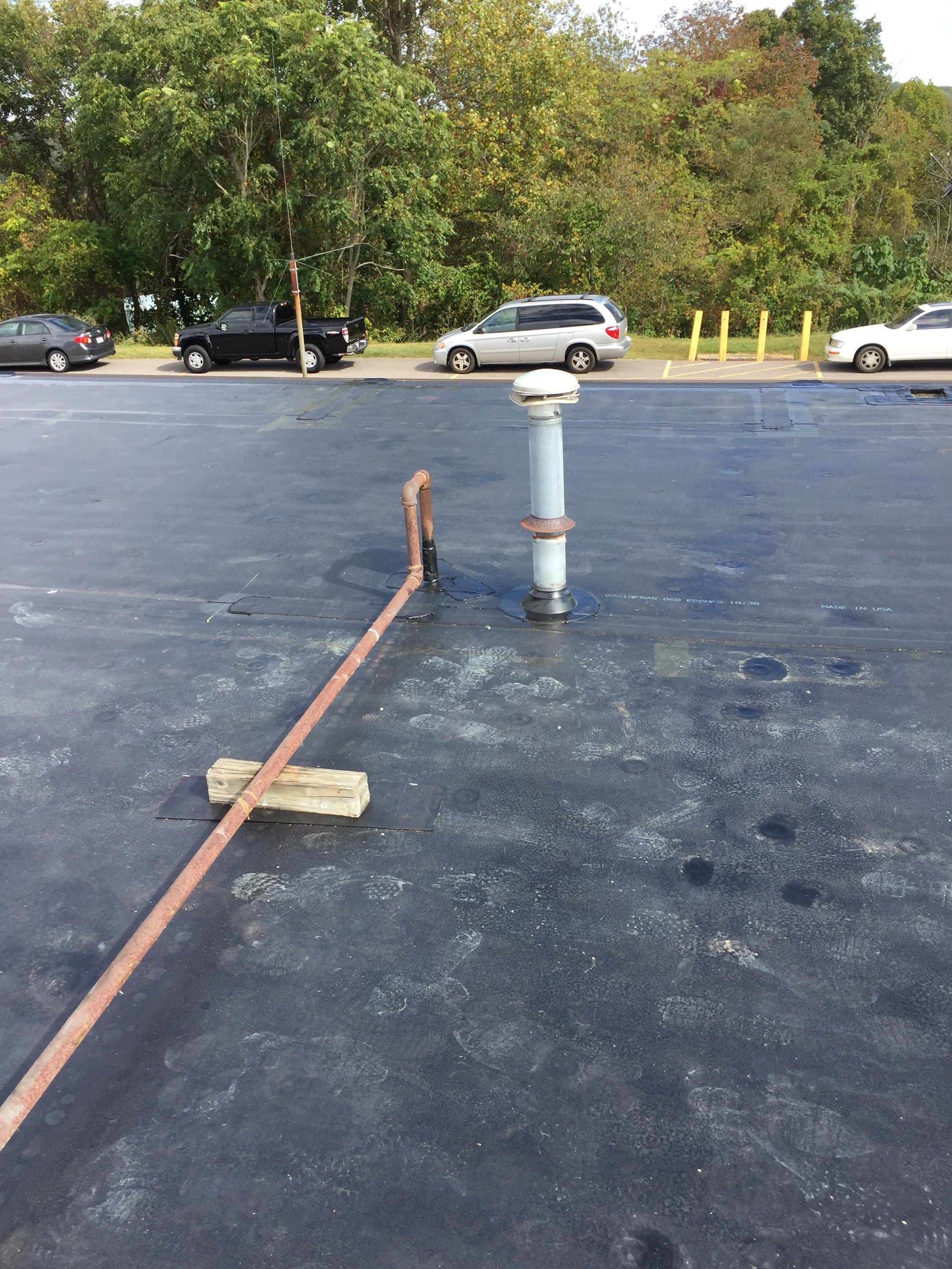 Commercial Rubber Roofing  using Carlisle Rubber Roofing System by Secure Construction Company Inc