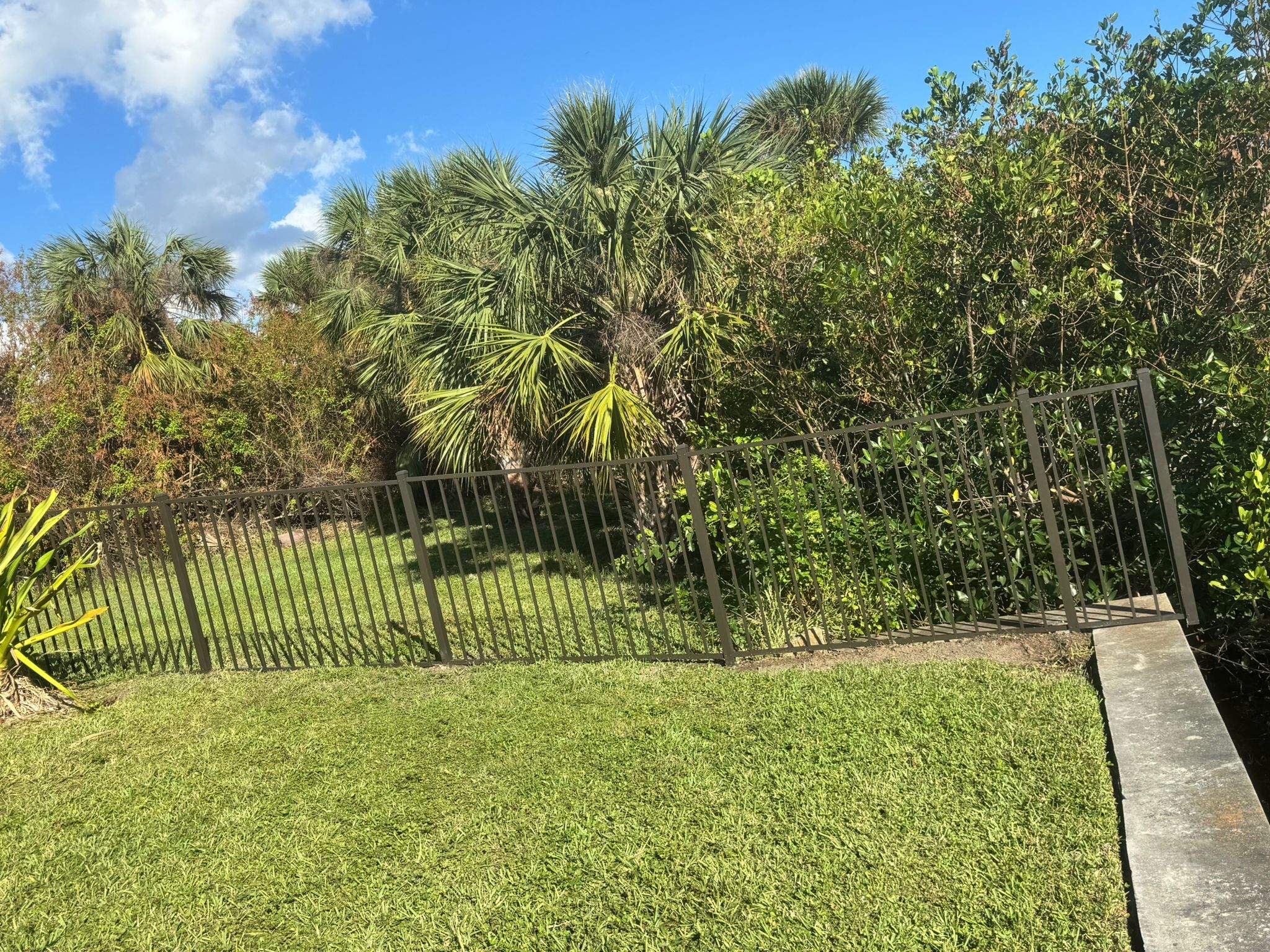 Bronze Aluminum Picket Fence Installation in Port Charlotte by True Fence LLC