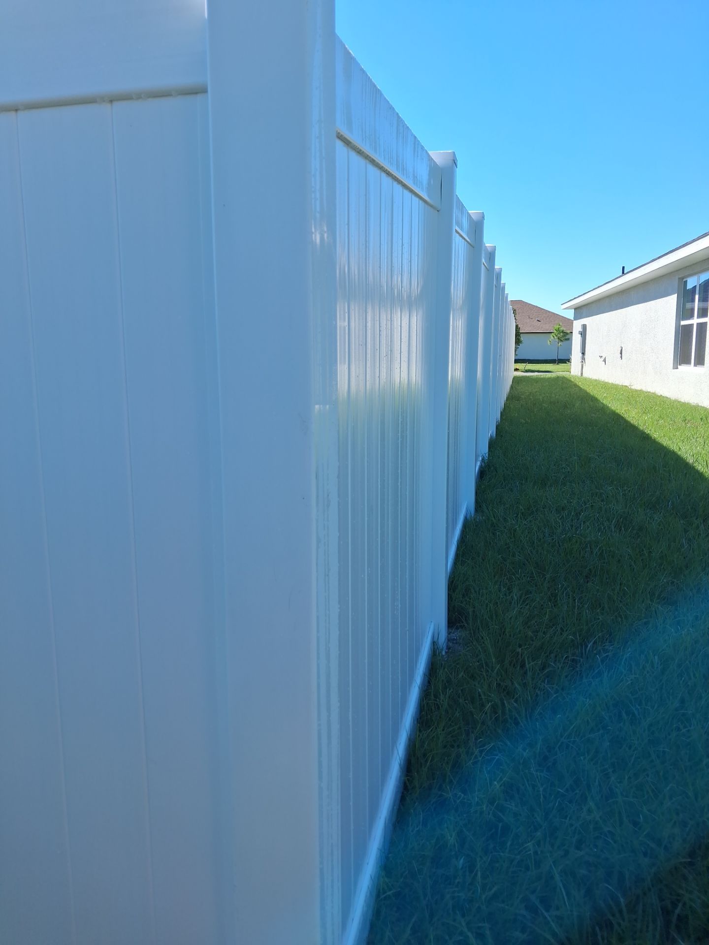 White Vinyl Privacy Fence Installation for North Port Residence by True Fence LLC