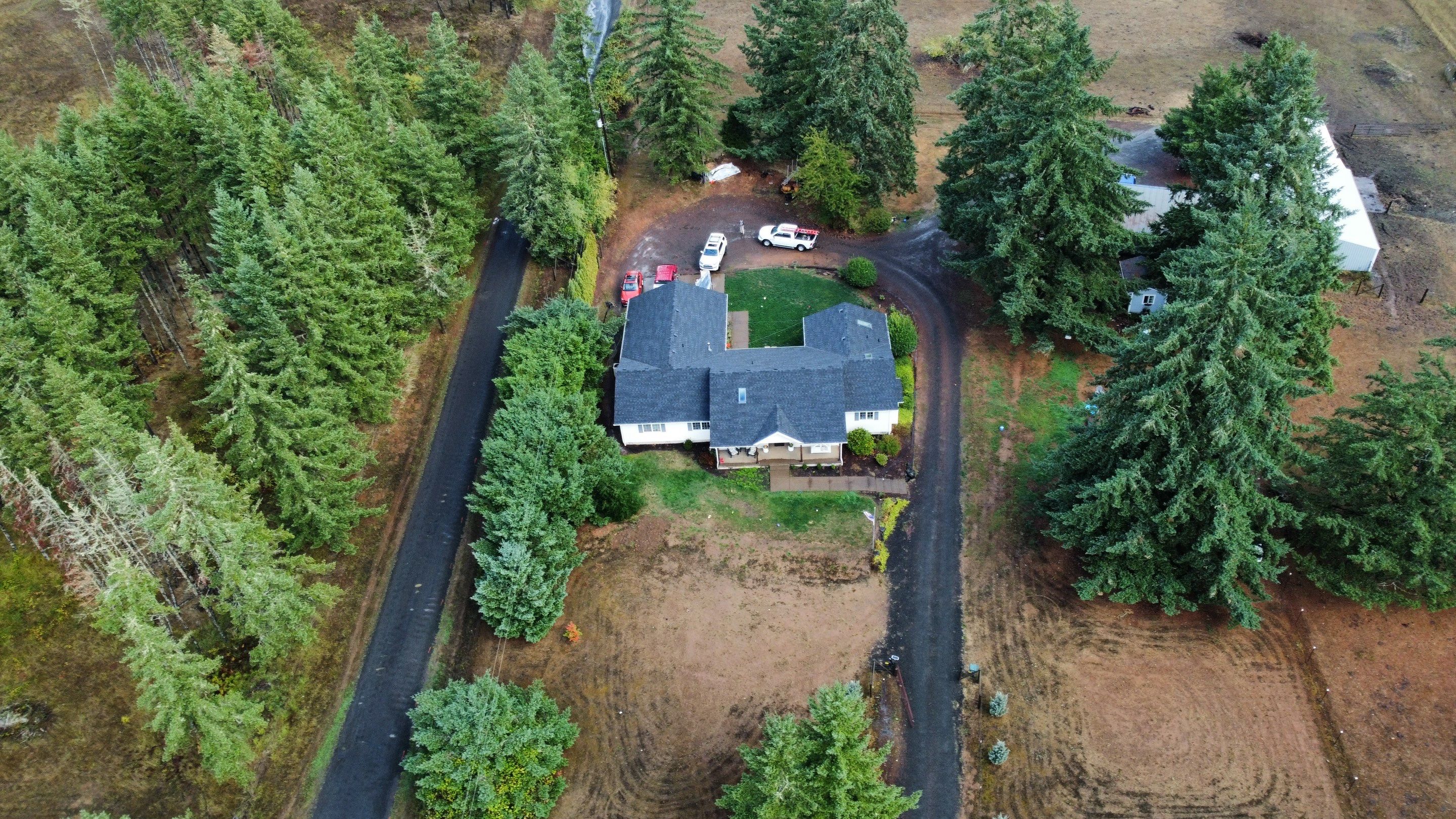 Residential Roofing Installation using IKO Dynasty (Color: Granite Black) by Orezona Building & Roofing Company, Inc.