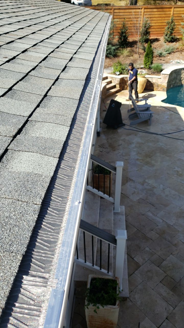 Gutter Cleaning using water by Power Wash Masters LLC