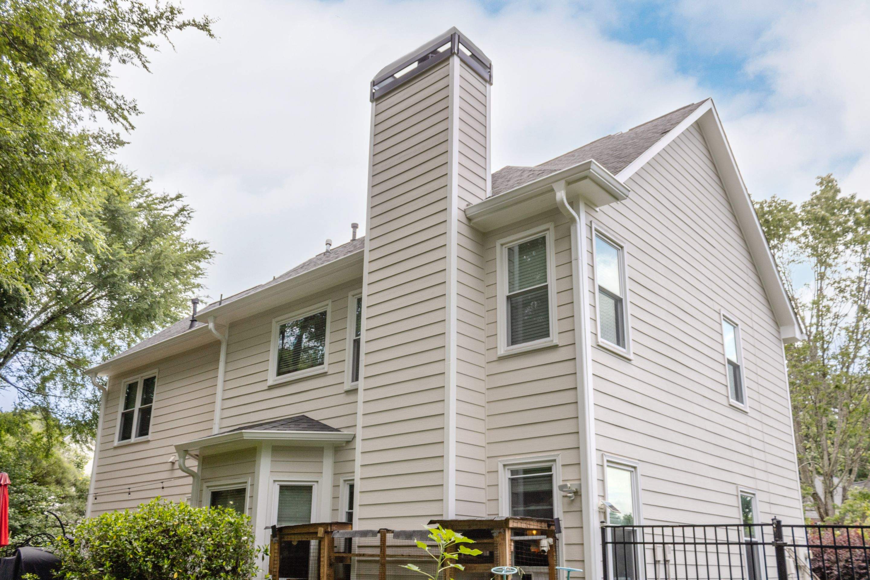 Marietta, GA Chimney Siding, Fascia, and Soffit Replacement using James Hardie Lap Siding, Hardie Trim, and Hardie Panel by Nelson Exteriors 