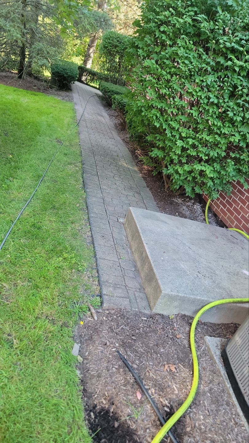 Brick paver repair, clean and seal by Northern Power Washing LLC.