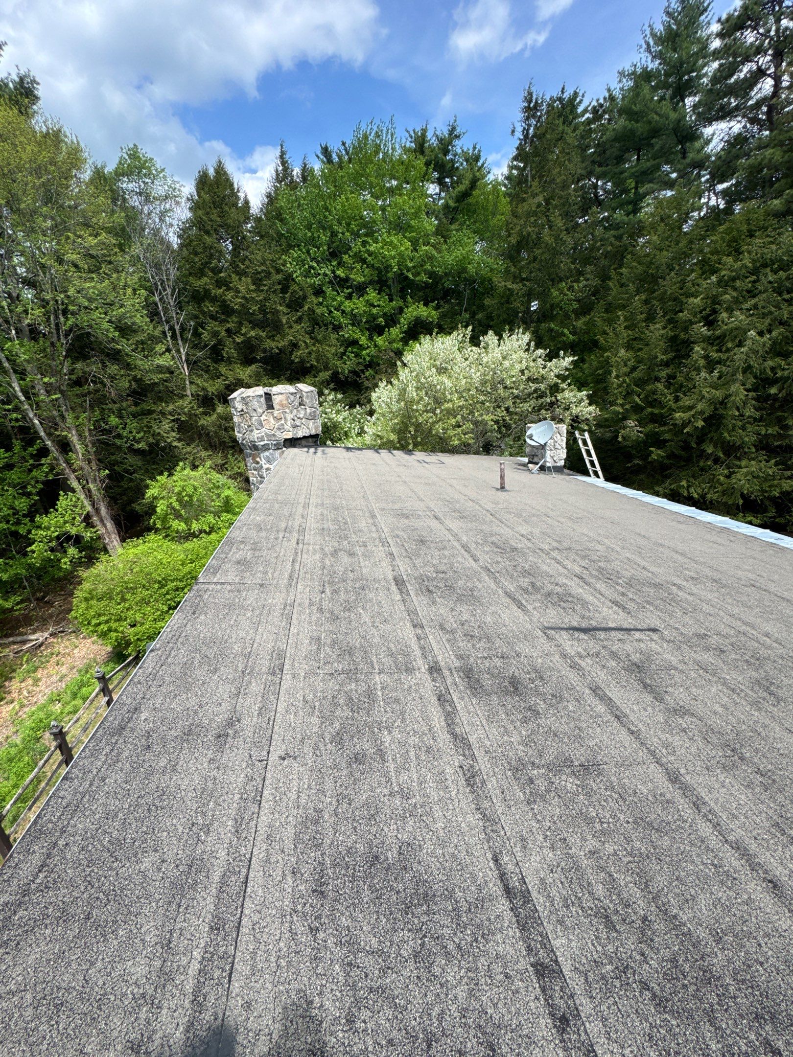 Deerfield, NH Roof Replacement Near Deerfield Fairgrounds with Custom EPDM Rubber Roofing for Stone Turrets by Compass exteriors
