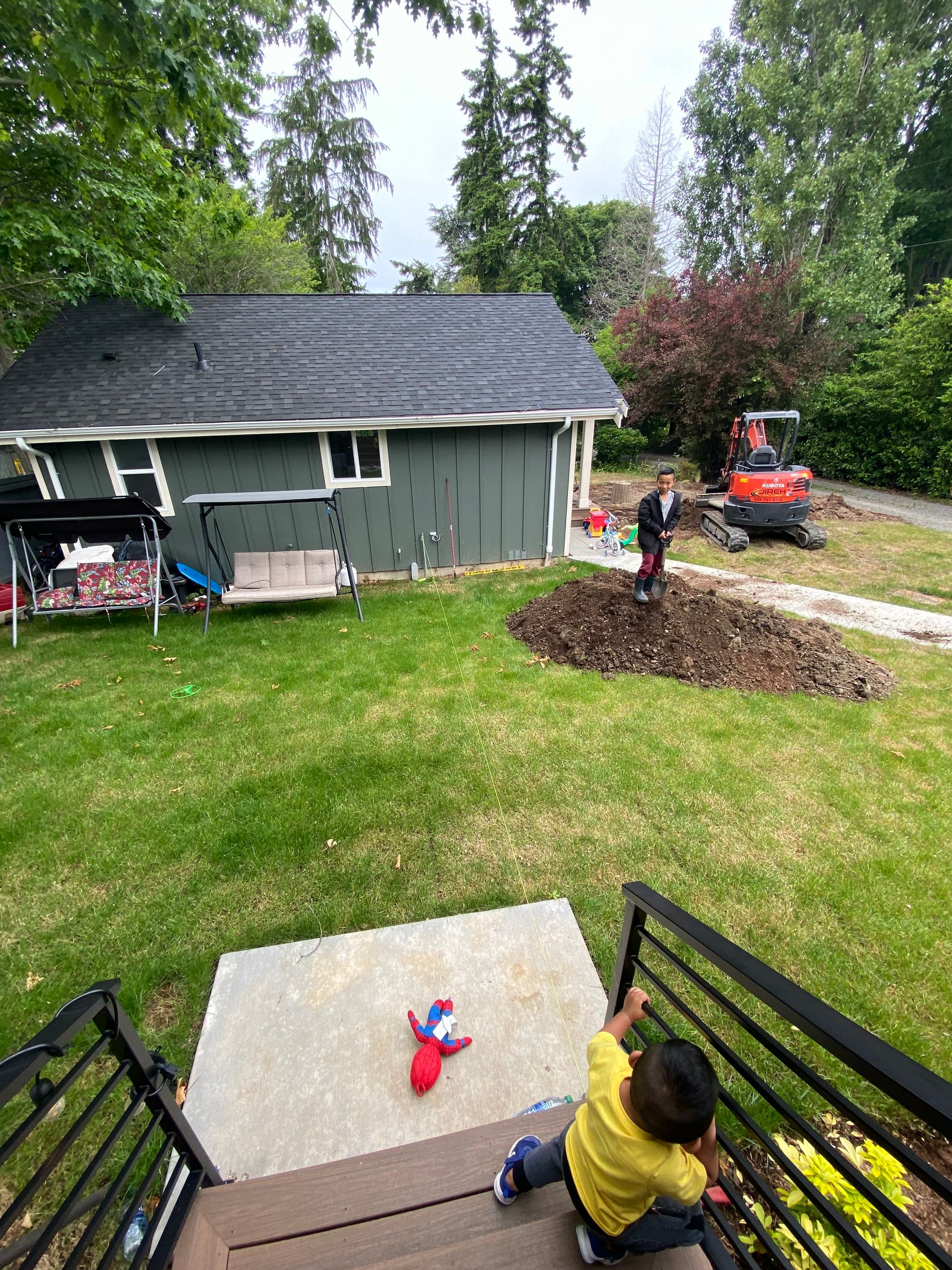 Patio Installation using Concrete, Retaining walls, and Turf install by Jireh Asphalt & Concrete Inc 
