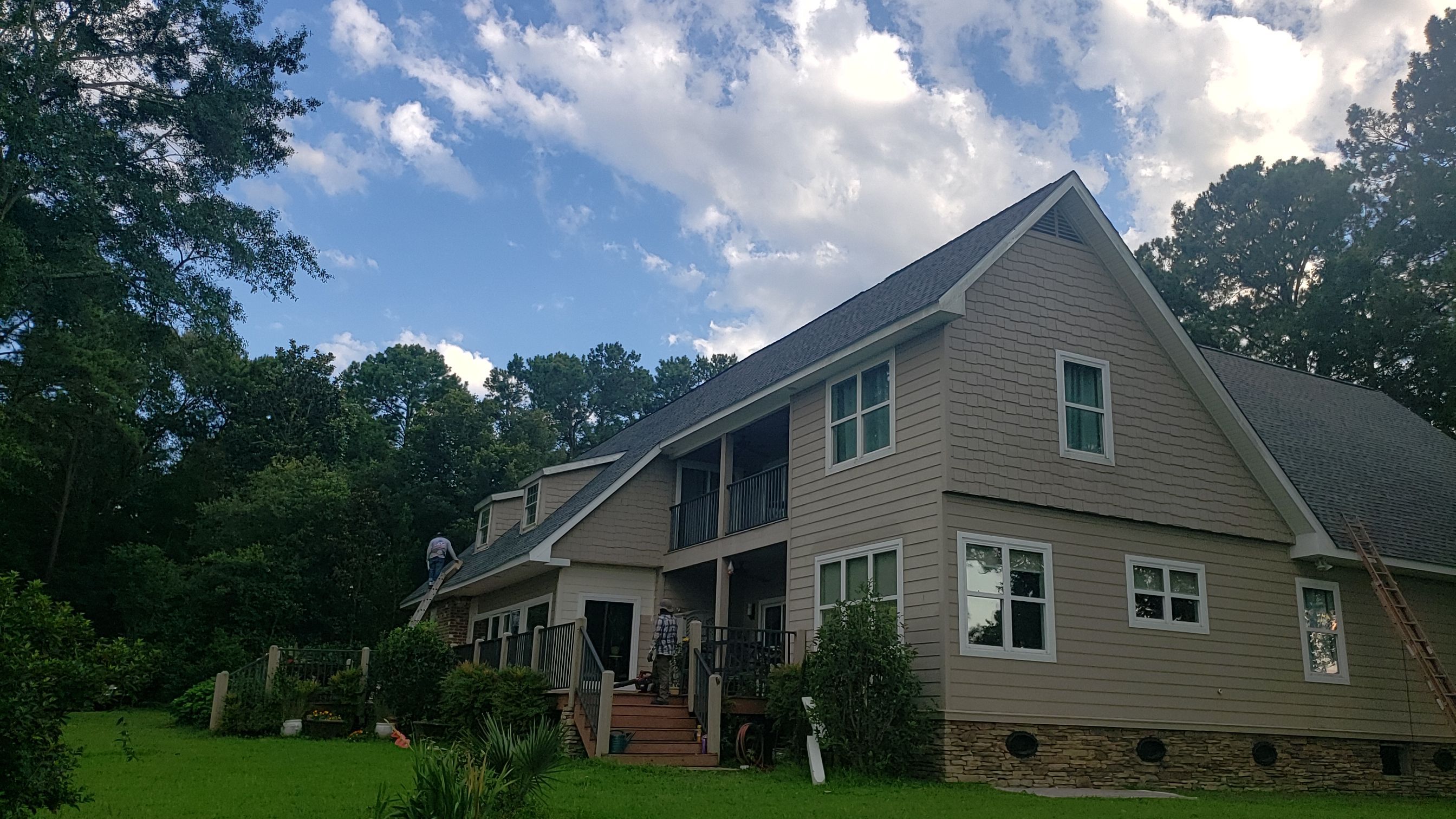 Residential Roofing Installation using Roof Replacement by American Roofing & Construction LLC