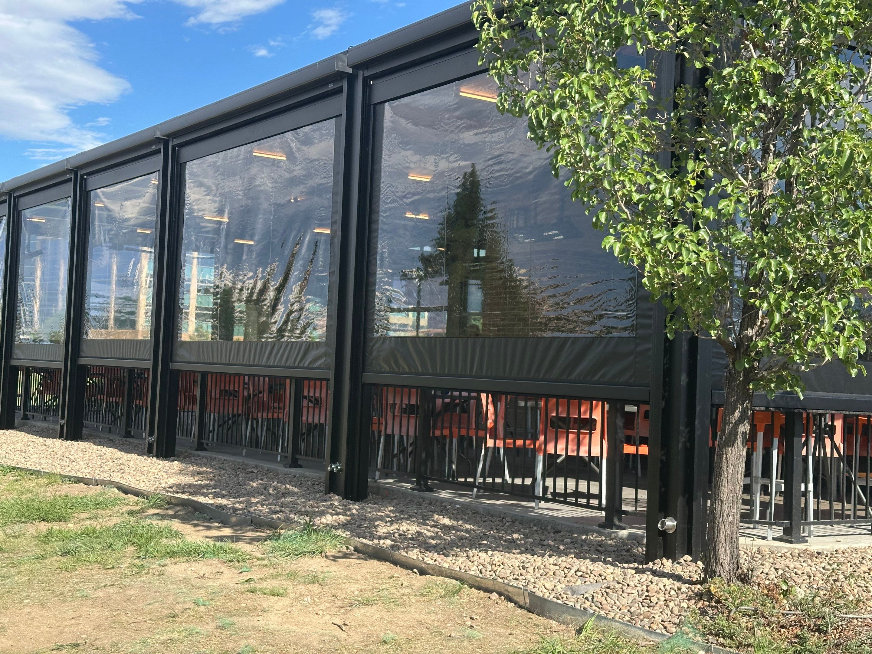 Commercial Azenco Pergola and MagnaTrack Screen Installation in Lone Tree by Outdoor Solutions Colorado
