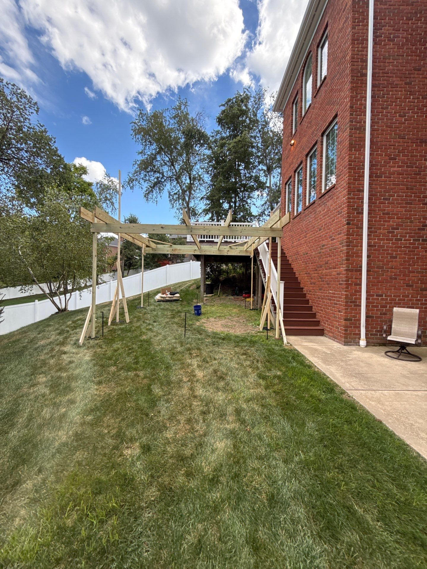 Deck extension  by Cousins Roofing Siding & Decks