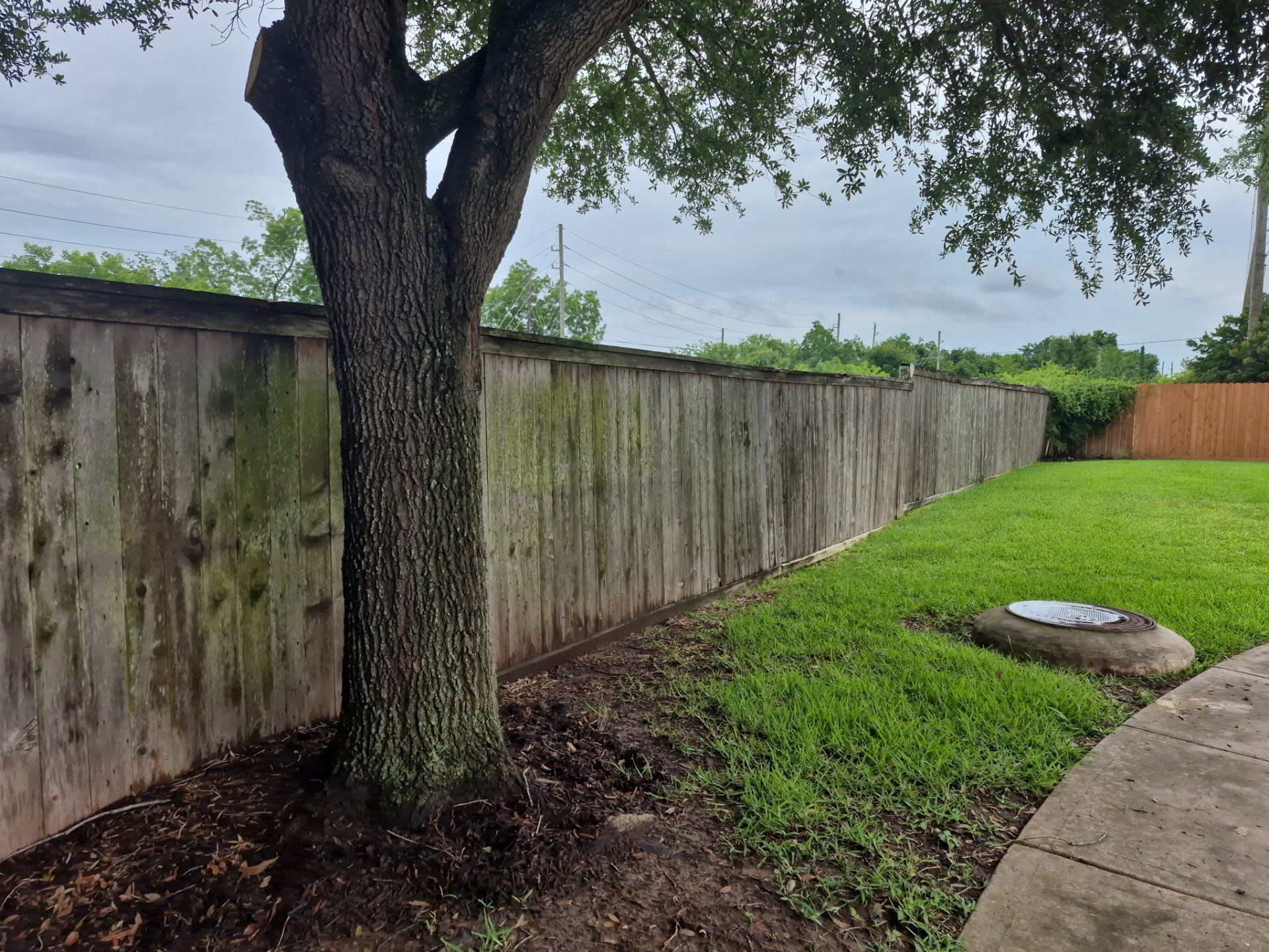 Wood Fence Installation for HOA by Tim's Fences
