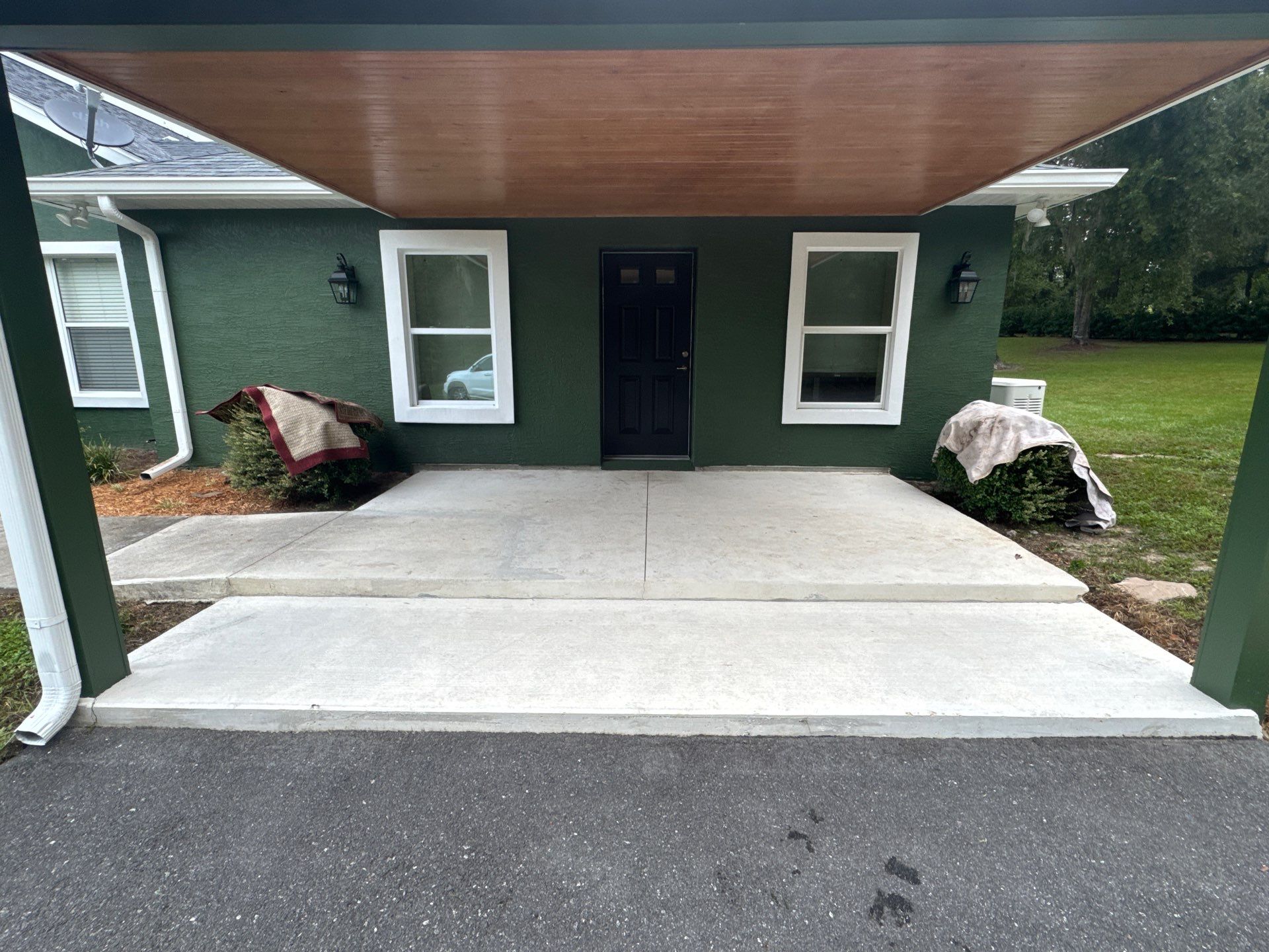 Porch Project in Reddick, FL in Pecan by Cross Creek Concrete Coatings