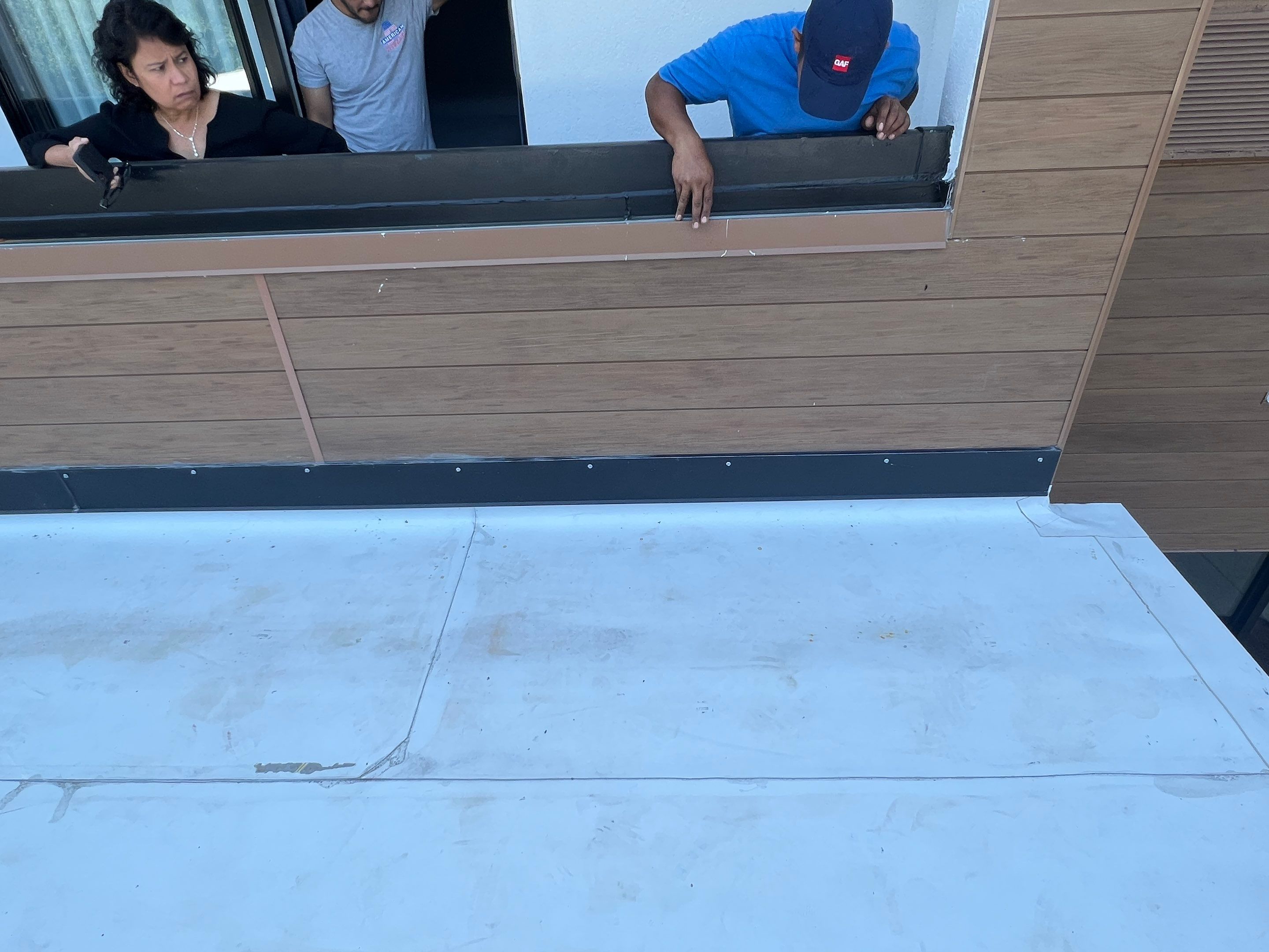 Commercial Roofing Installation using Roof Replacement by American Roofing & Construction LLC